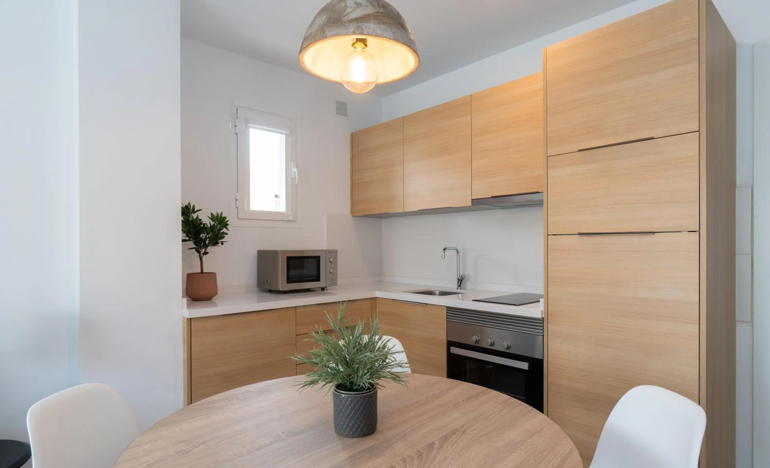 Kitchen or kitchenette in Sur Suites La Dorada, centricos soleados a pocos metros de la Playa y con Parking Opcional