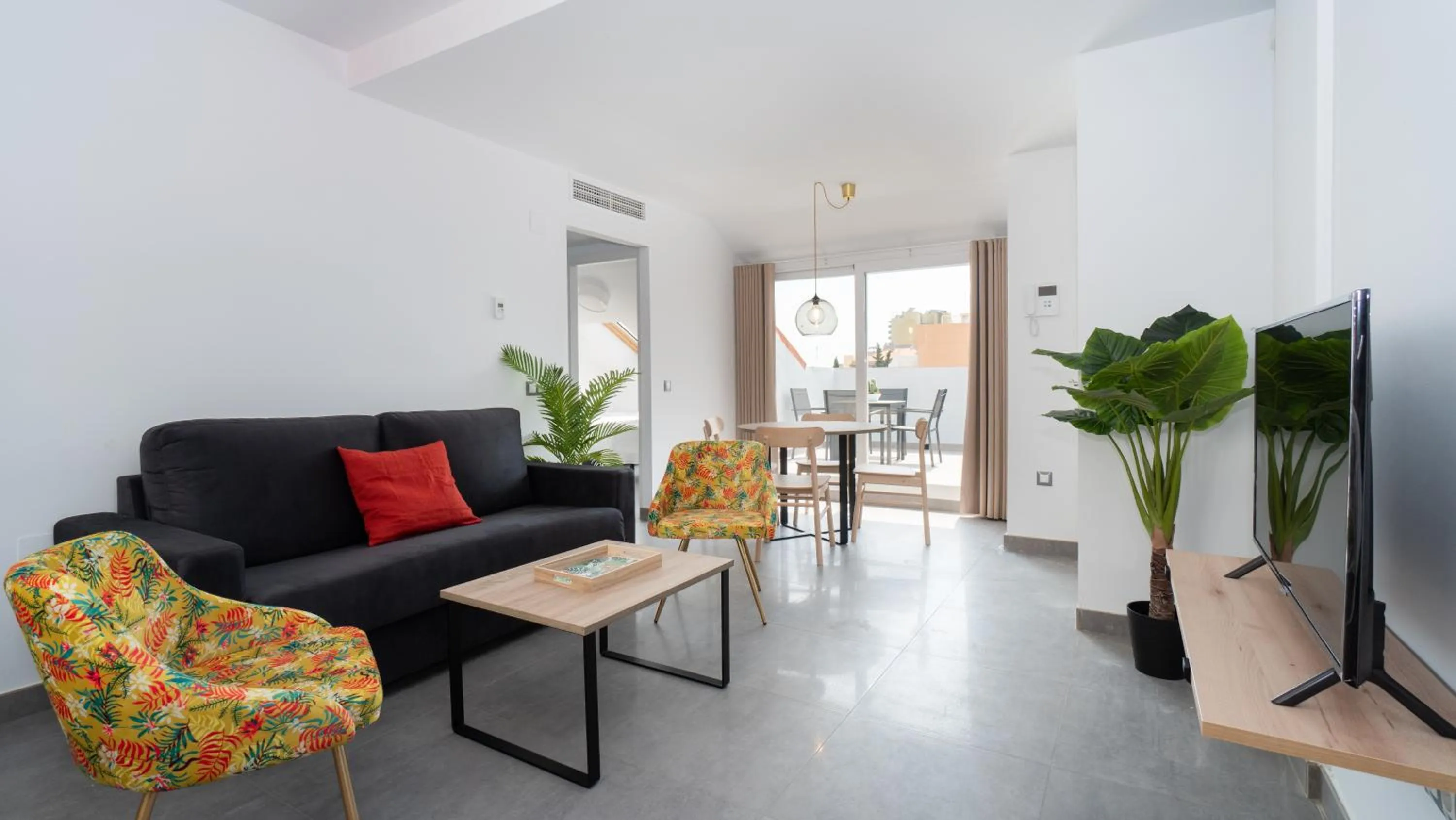 Living room in Sur Suites La Dorada, centricos soleados a pocos metros de la Playa y con Parking Opcional