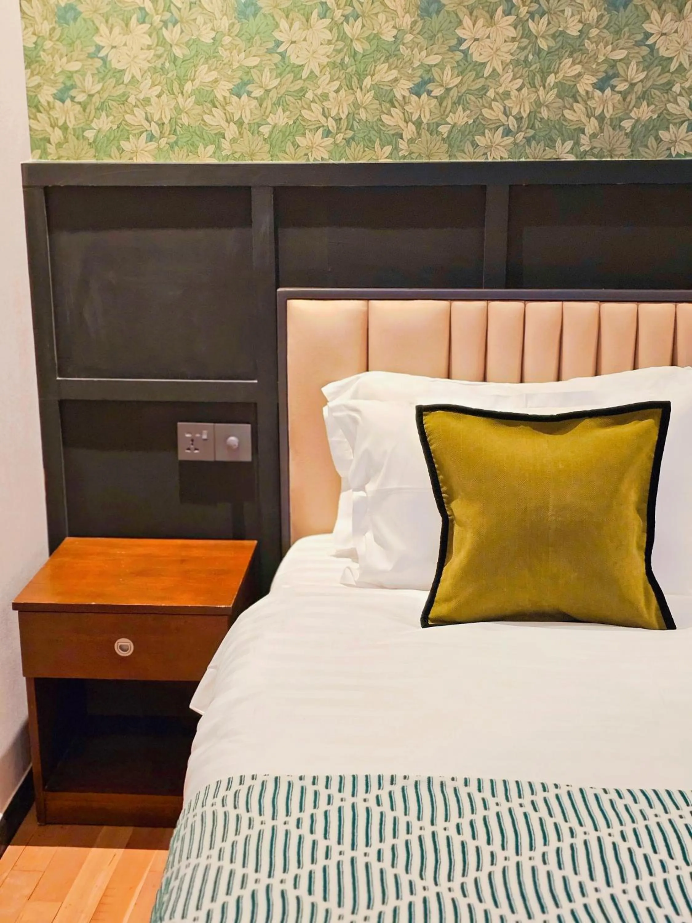 Bed in Carnarvon Suites