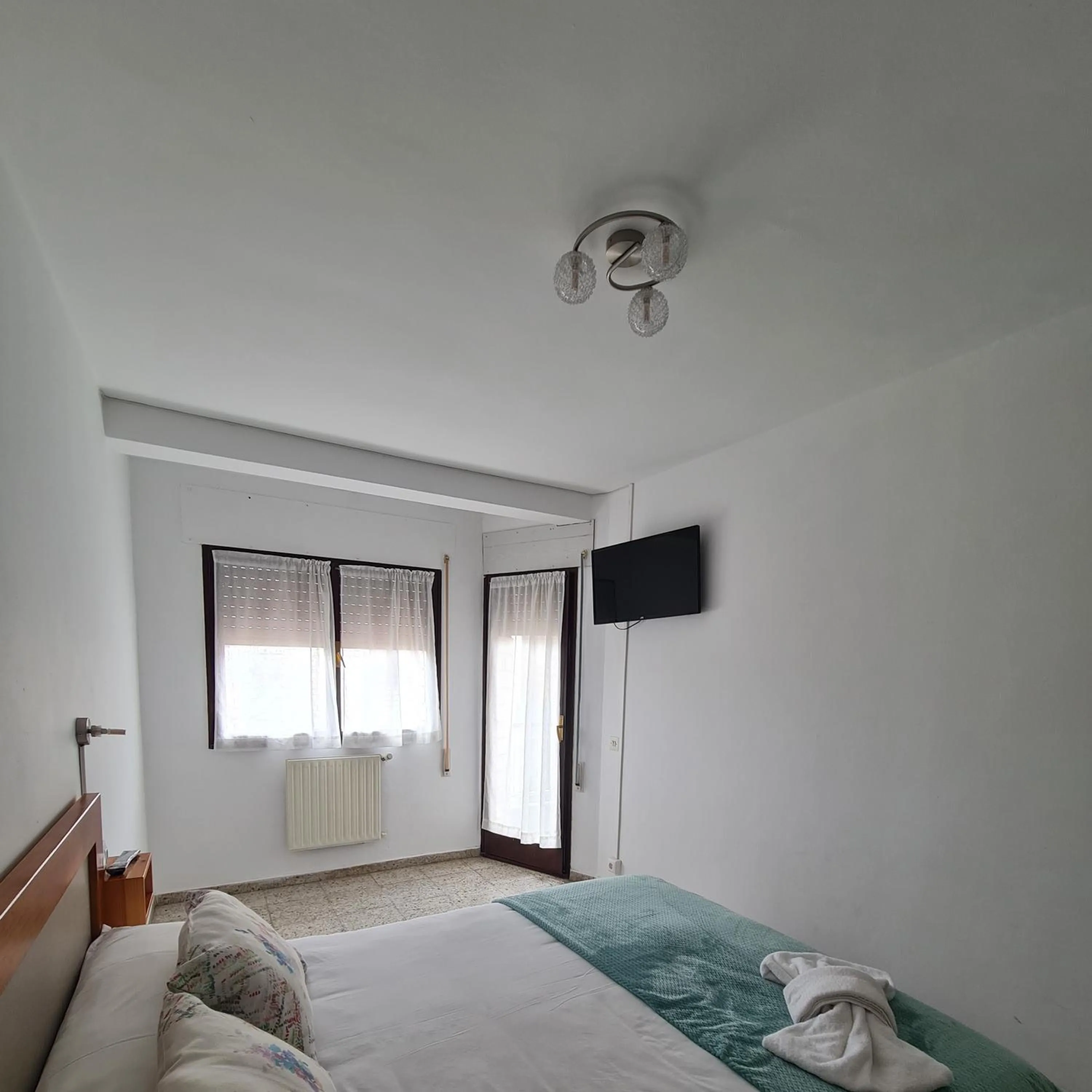 Bed in Apartamentos O Cargadeiro Ribadeo