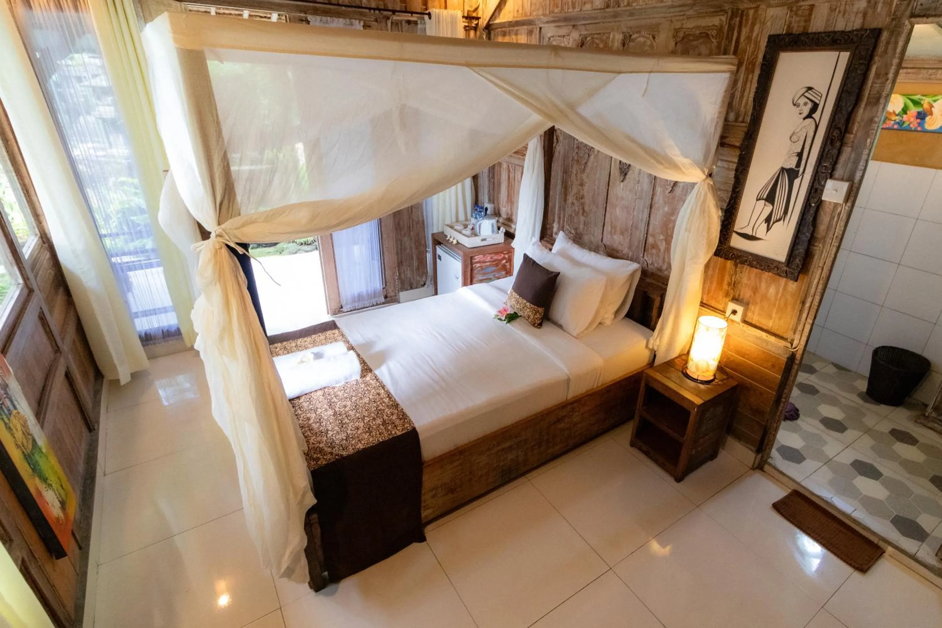 Bed in Royal JJ Ubud Resort & Spa