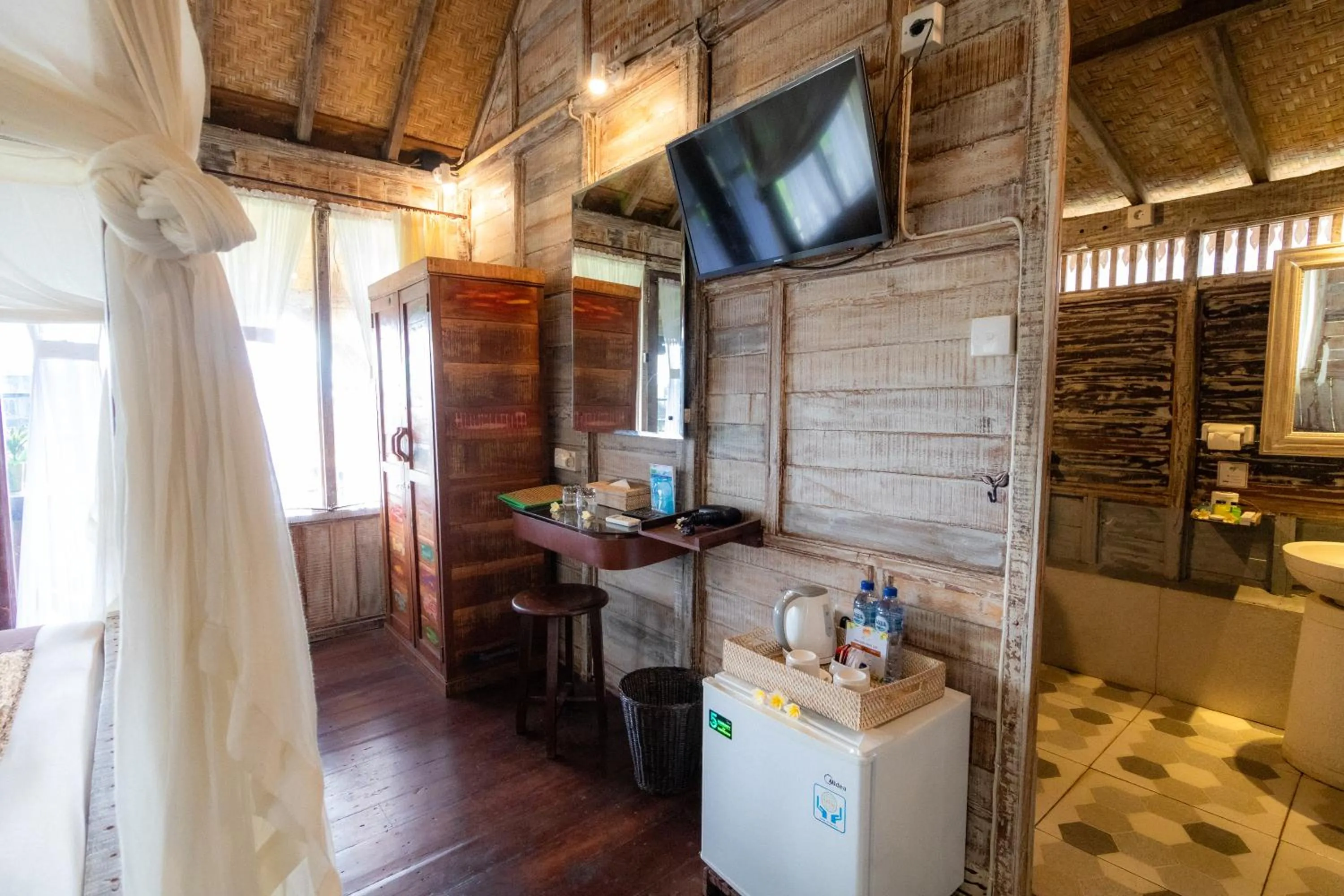 Bedroom in Royal JJ Ubud Resort & Spa