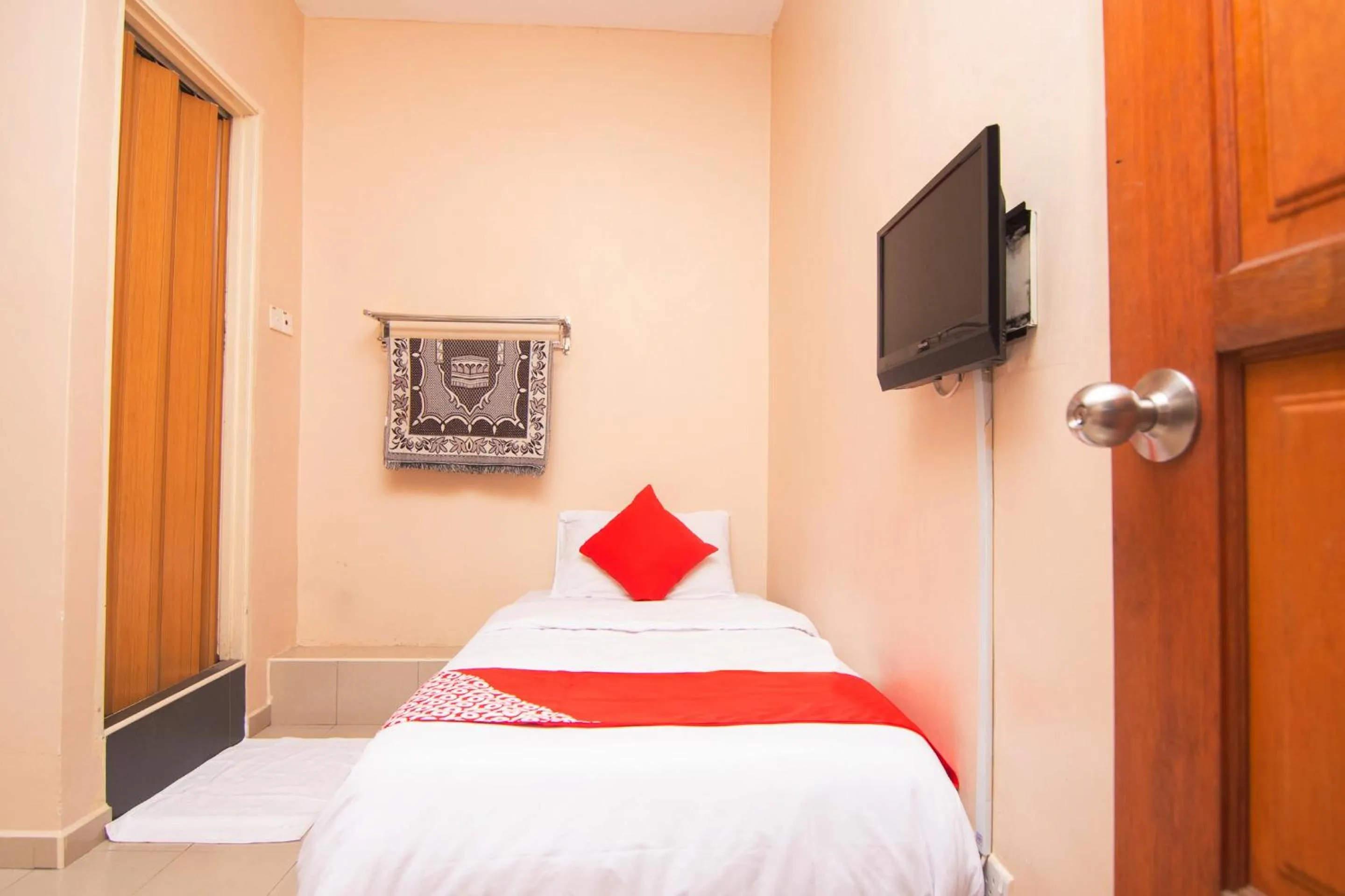 Bed in Hotel O Hajah Rohayah