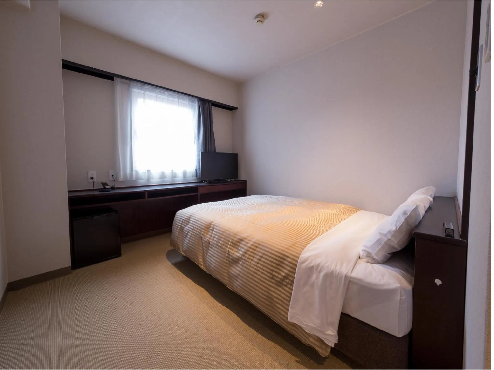Photo of the whole room, Bed in THE HOTELS HAKATA KASANE Bayside