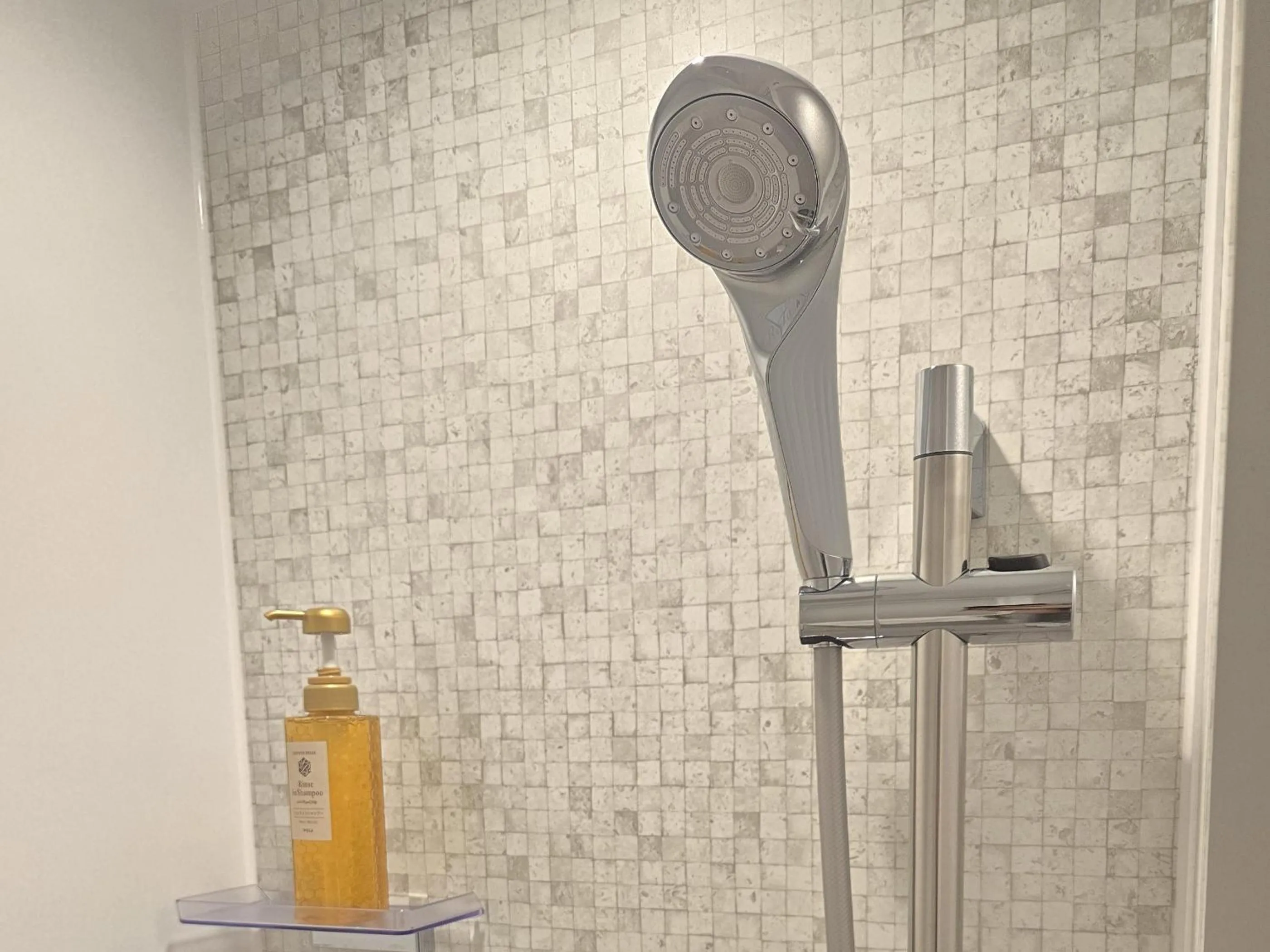 Shower in THE HOTELS HAKATA KASANE Bayside