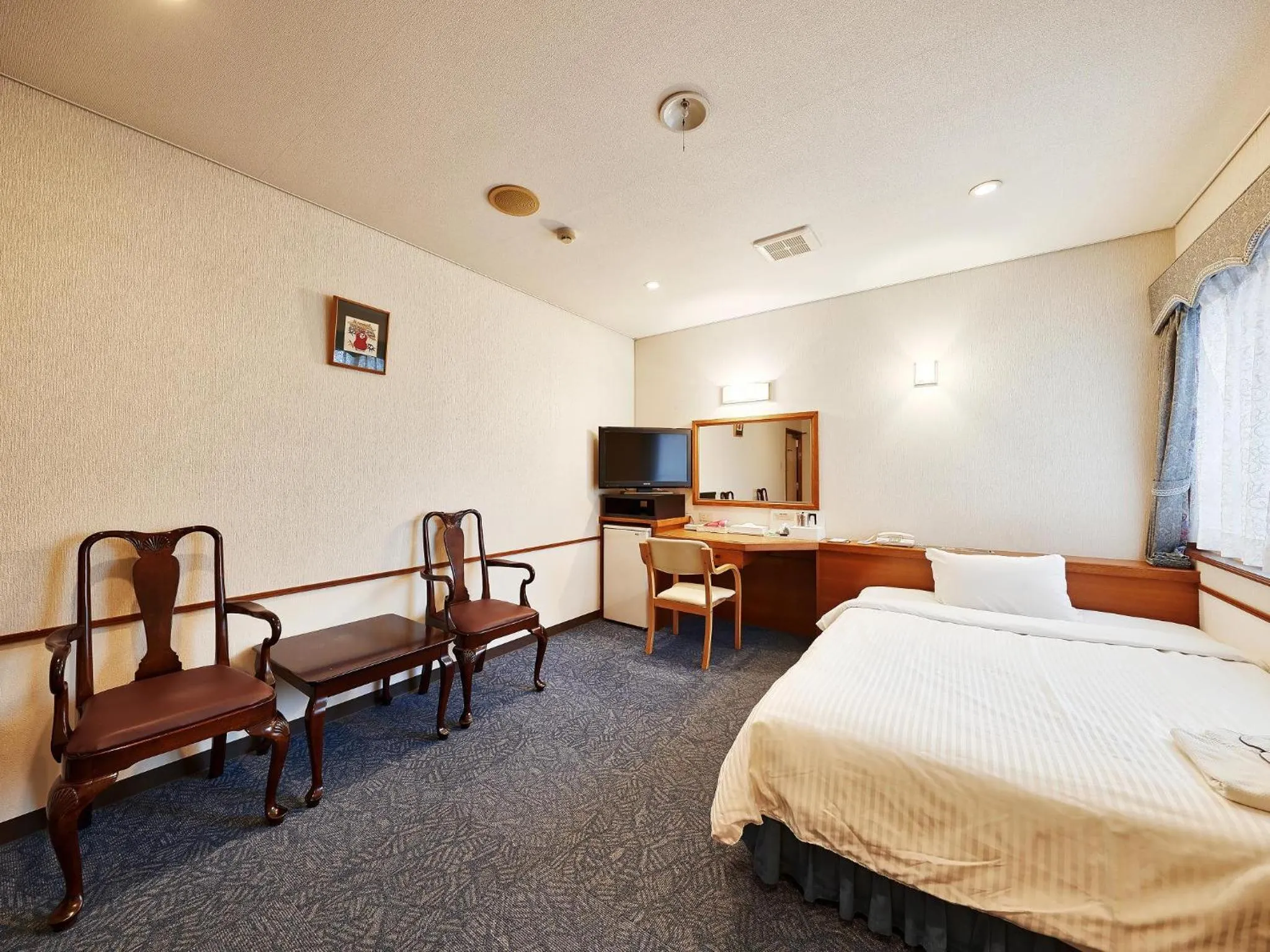 TV and multimedia, Bed in Crown Hotel Okinawa
