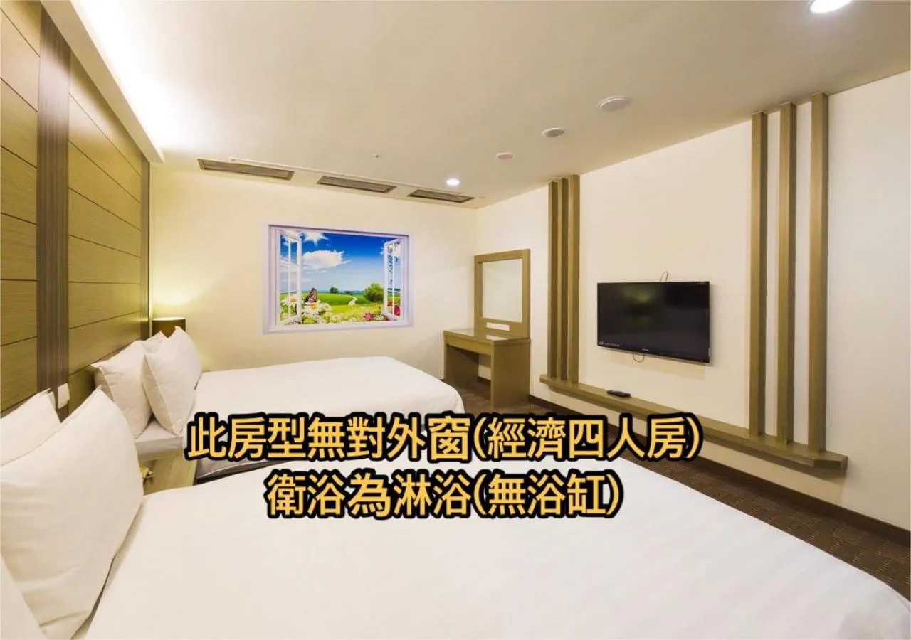 Bed in Cheng Wan Grand Hotel