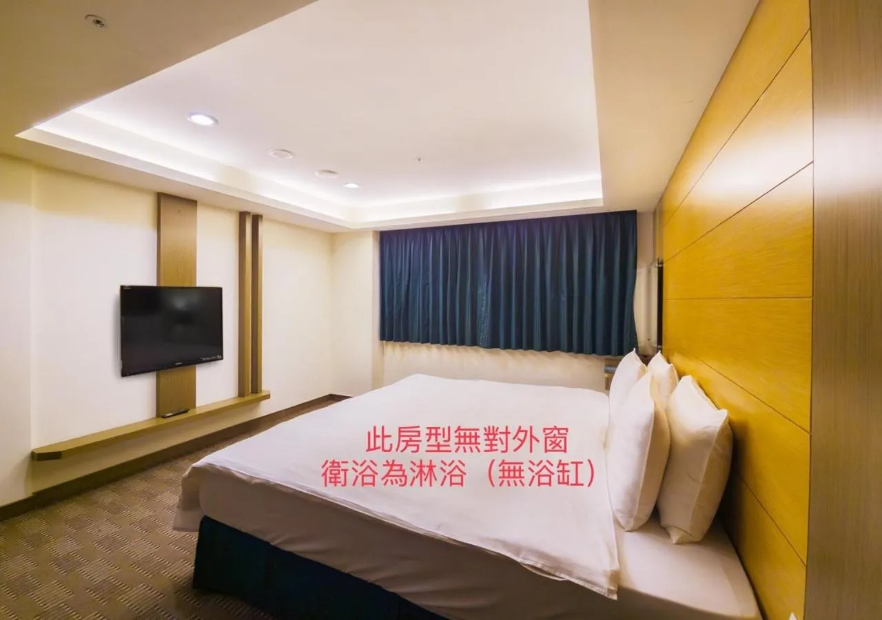 Bed in Cheng Wan Grand Hotel