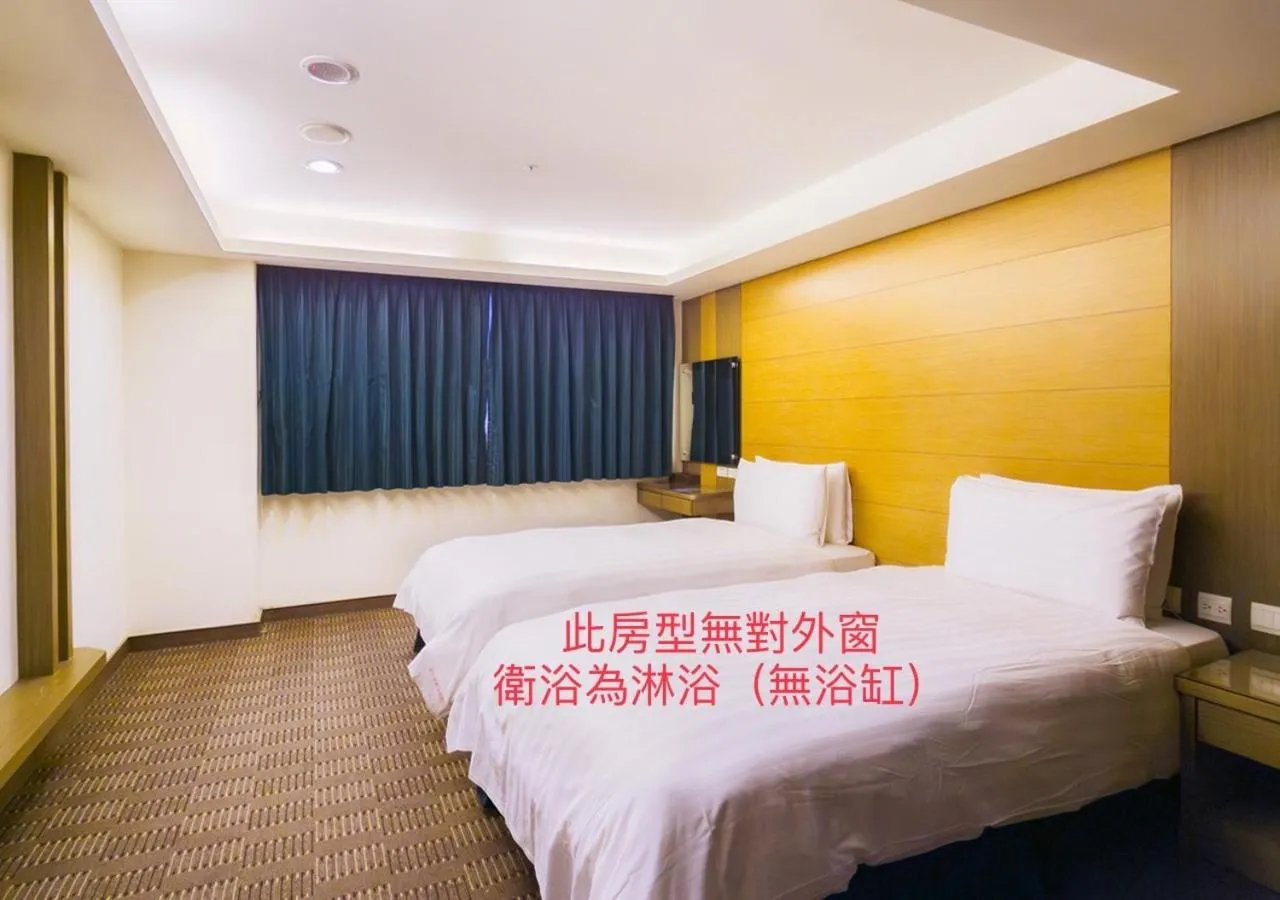 Bed in Cheng Wan Grand Hotel