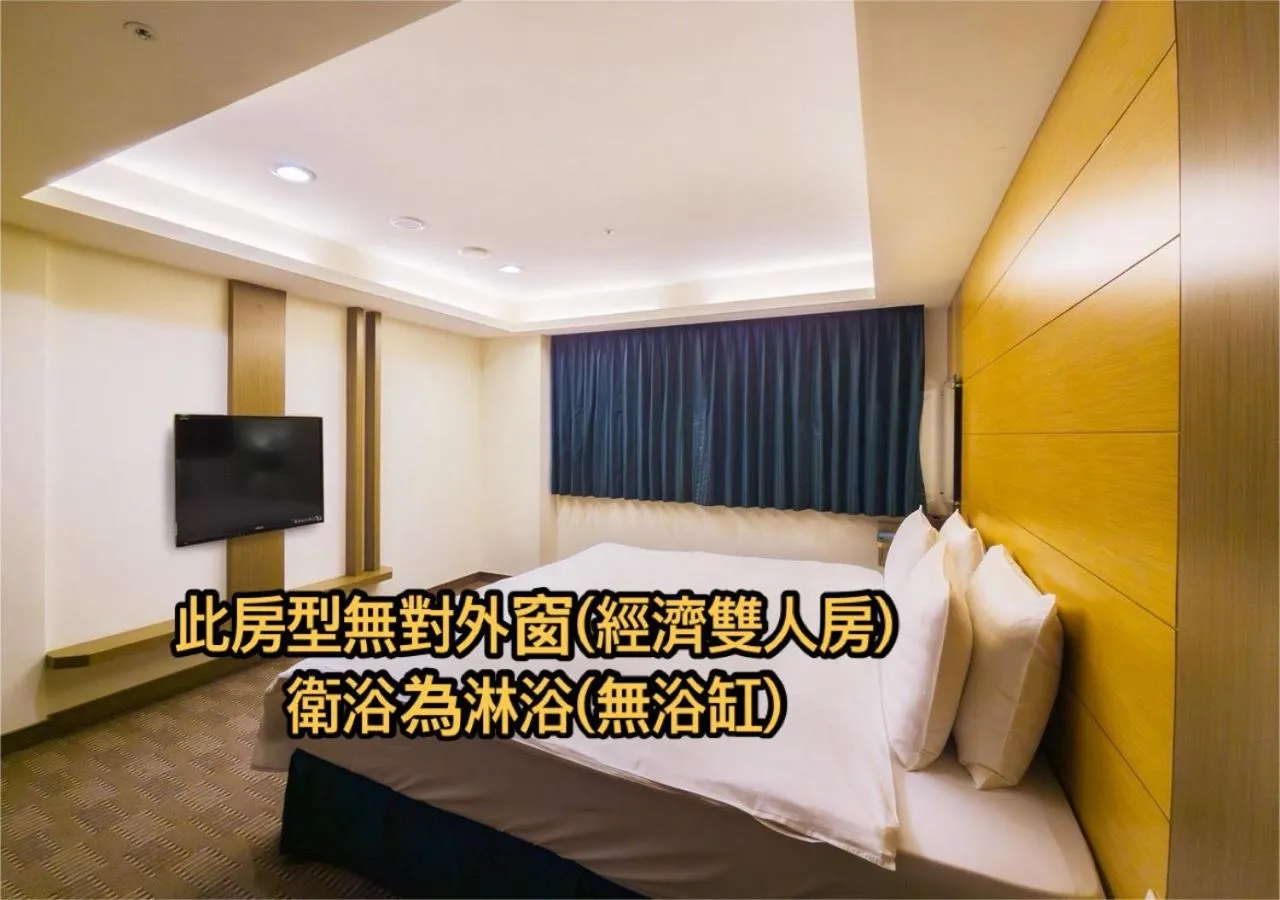 Bed in Cheng Wan Grand Hotel