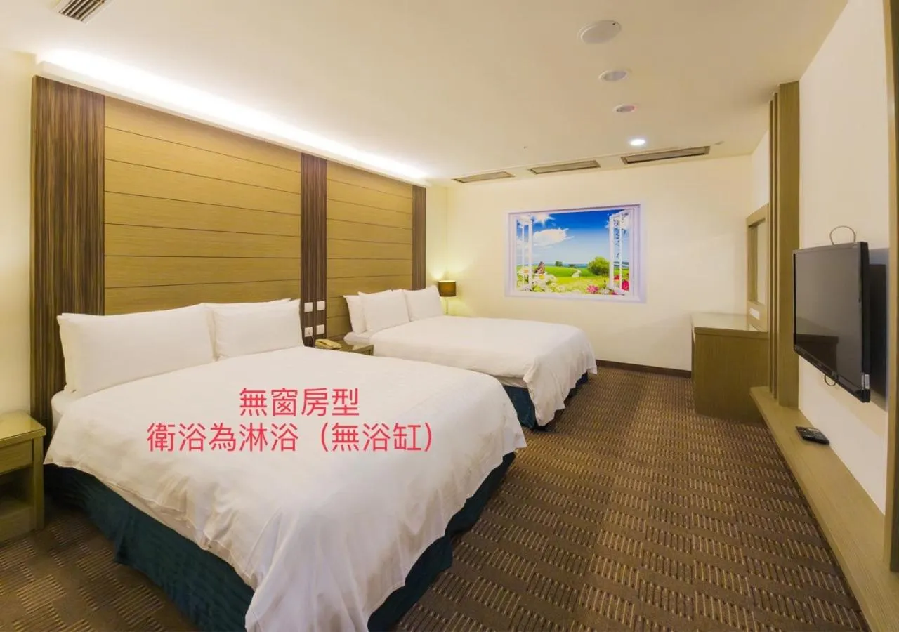 Photo of the whole room, Bed in Cheng Wan Grand Hotel