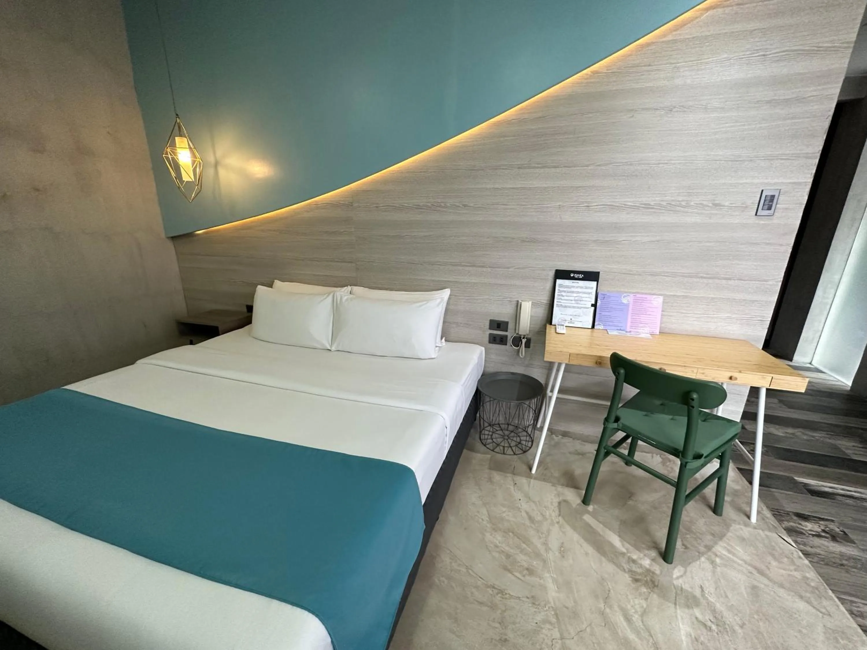 Bed in Zenvea Hotel