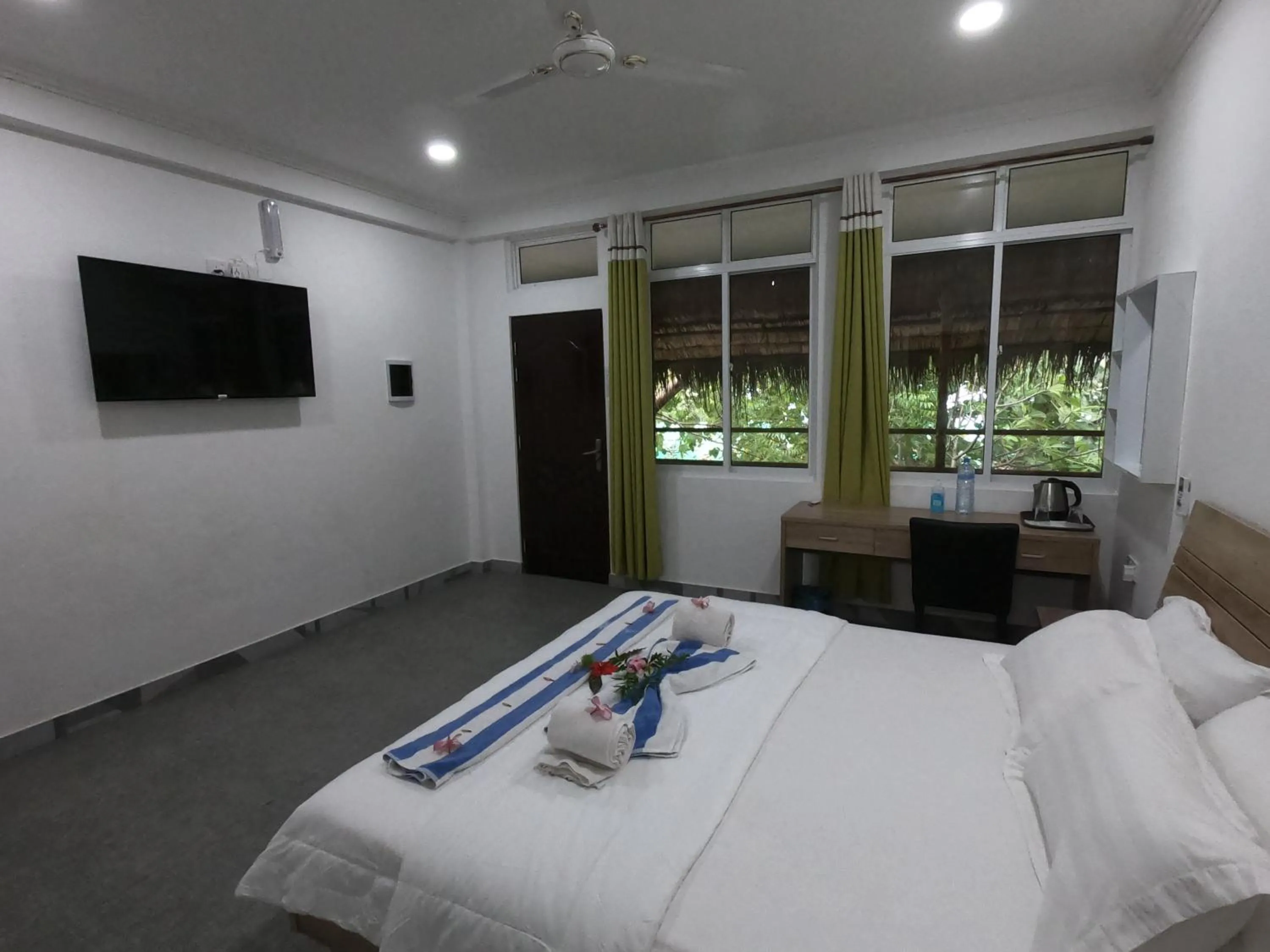 Photo of the whole room, Bed in Dhangethi INN