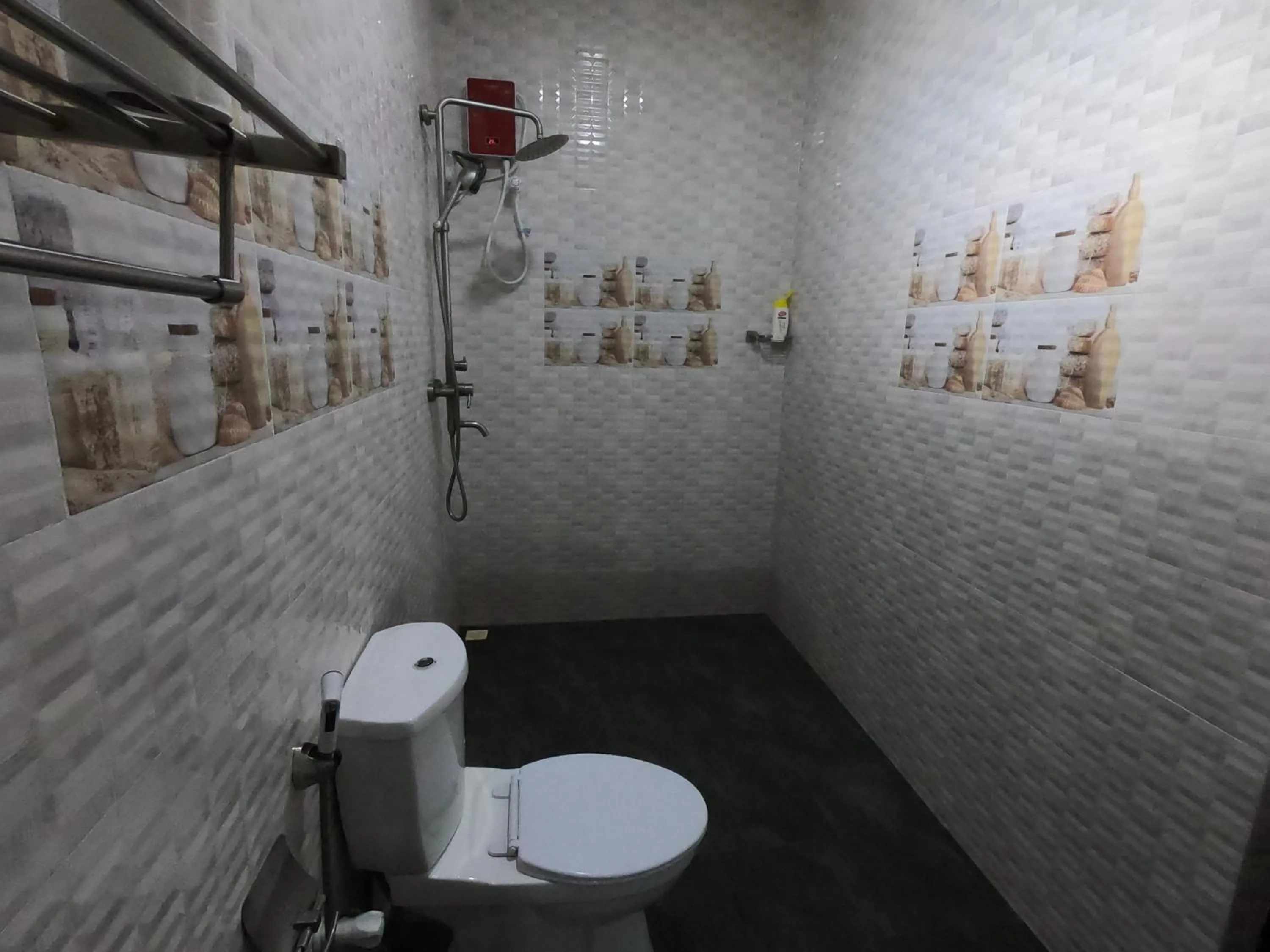 Bathroom in Dhangethi INN