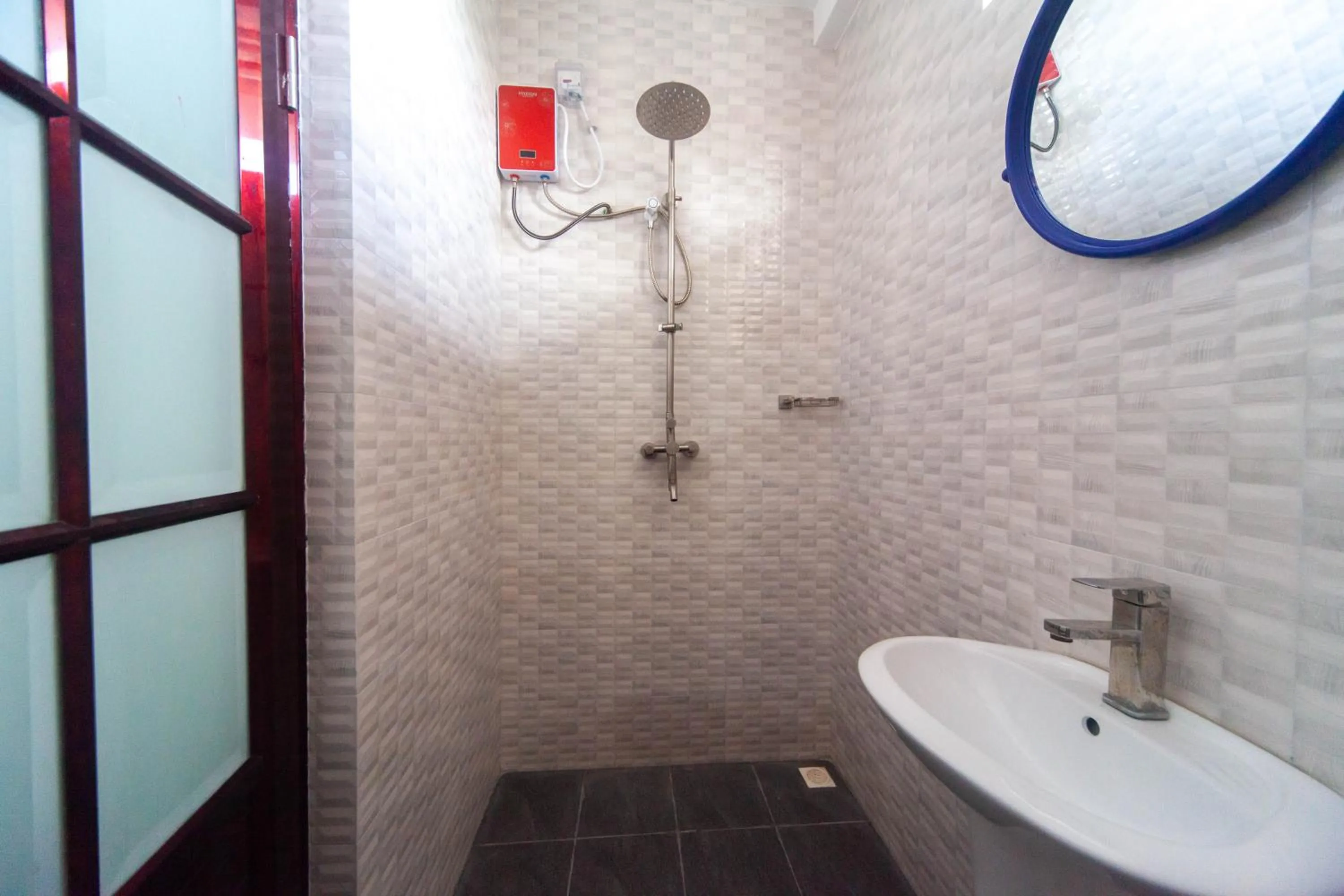 Bathroom in Dhangethi INN