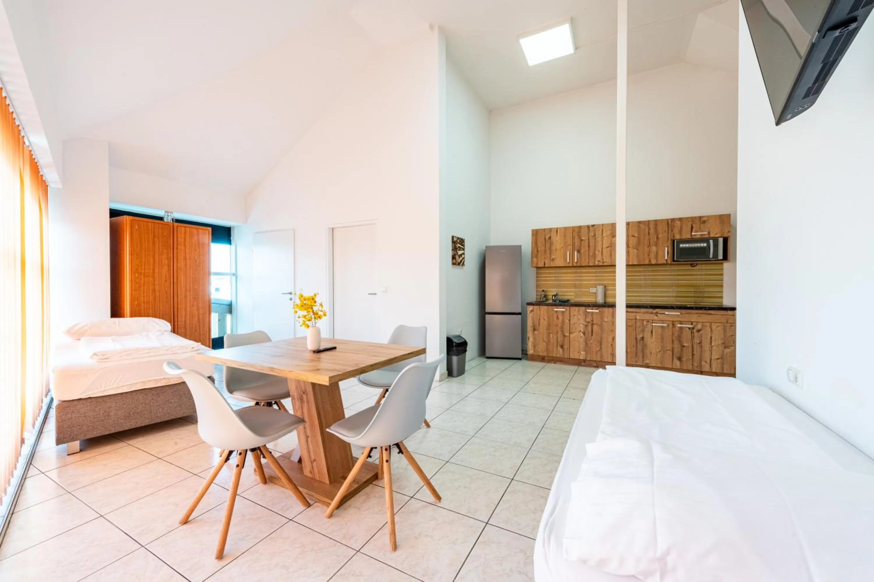 Kitchen or kitchenette, Bed in Apartment´s Marchtrenk