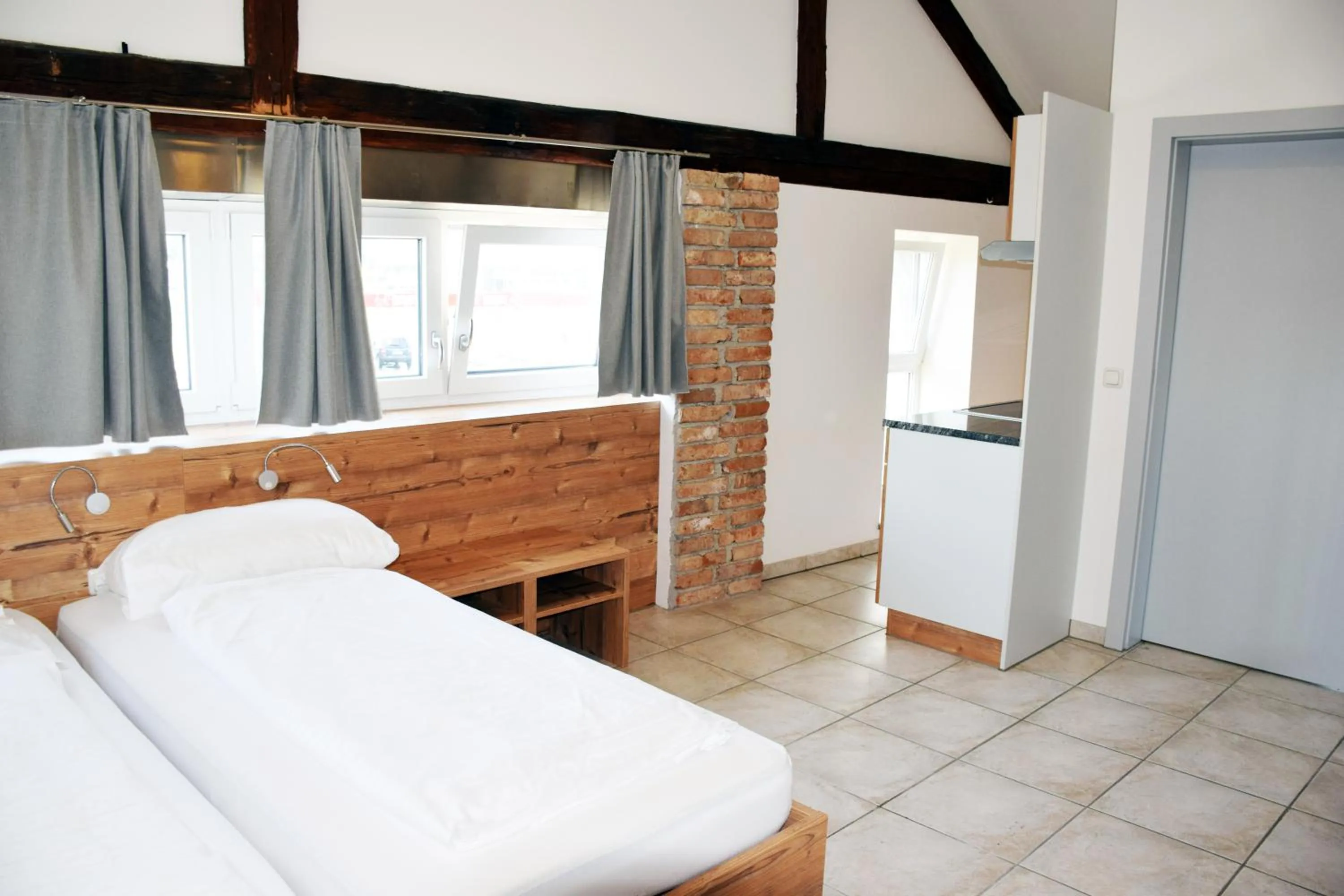 Kitchen or kitchenette, Bed in Apartment´s Marchtrenk