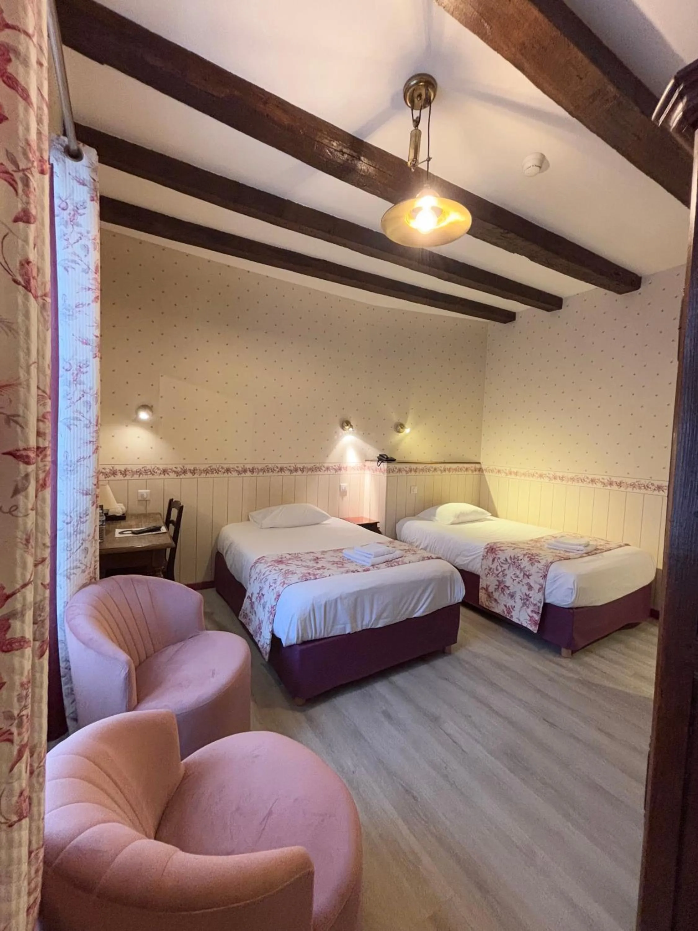 Bed in Hotel De La Poste