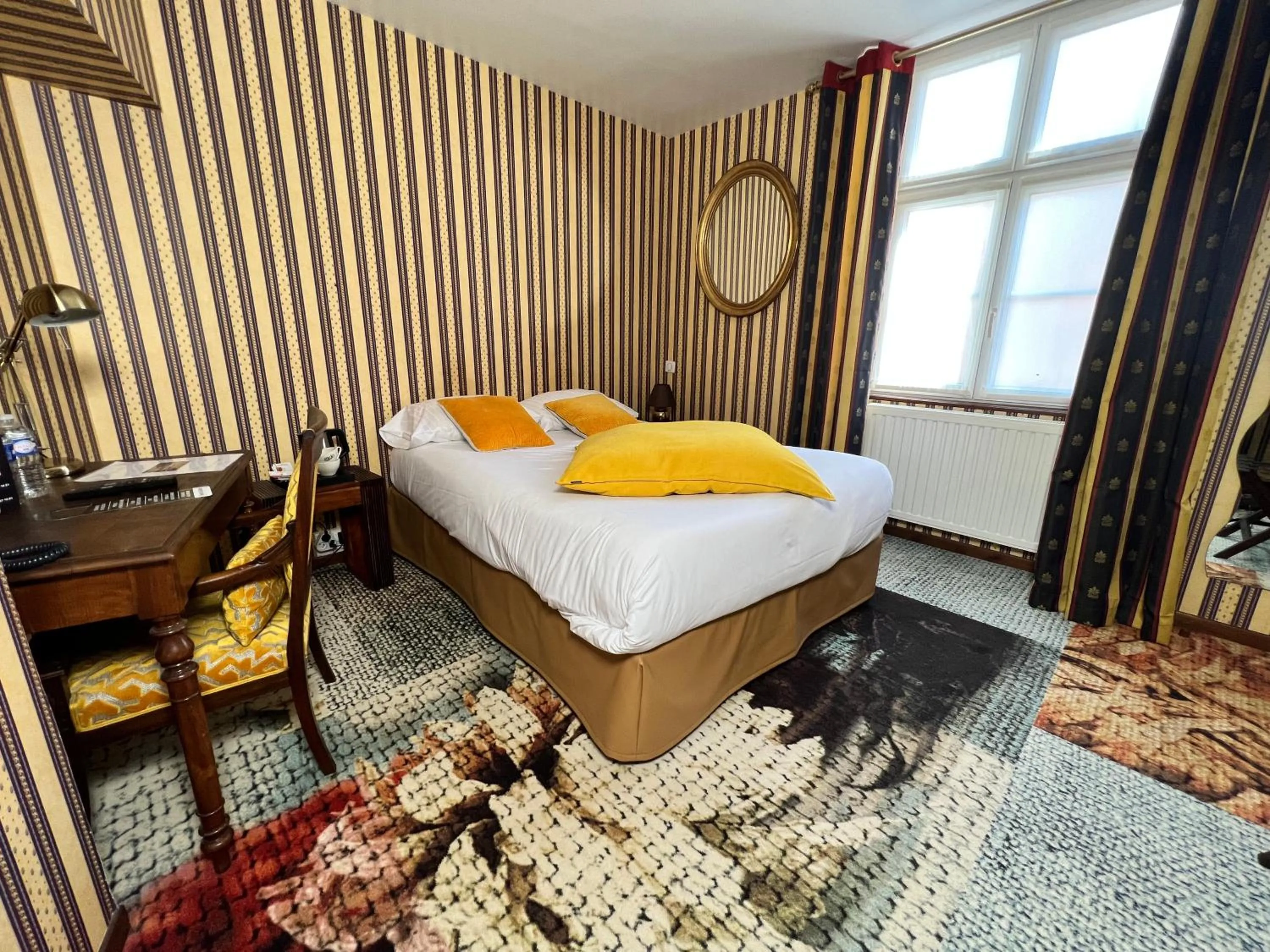 Bed in Hotel De La Poste