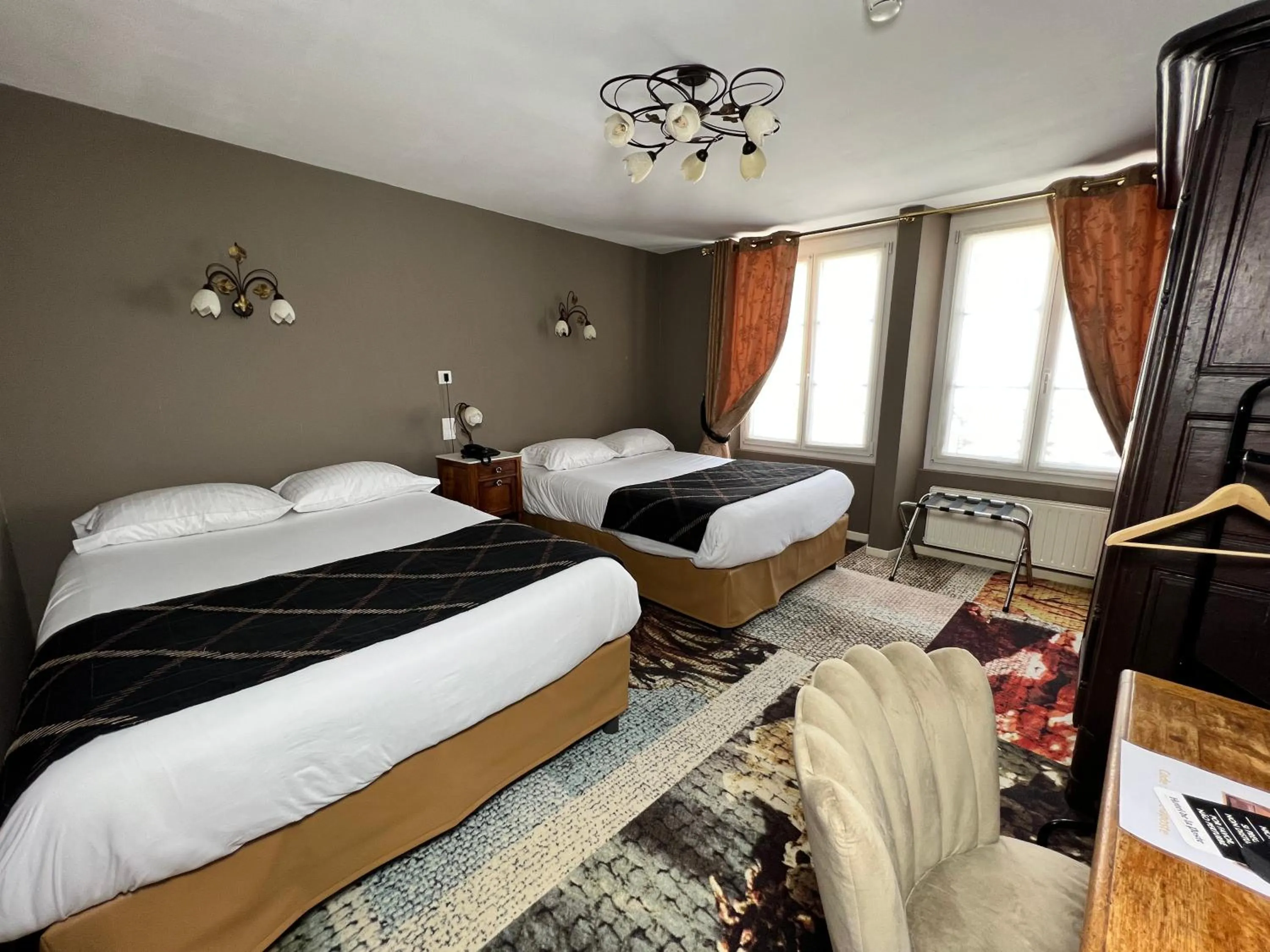 Bed in Hotel De La Poste