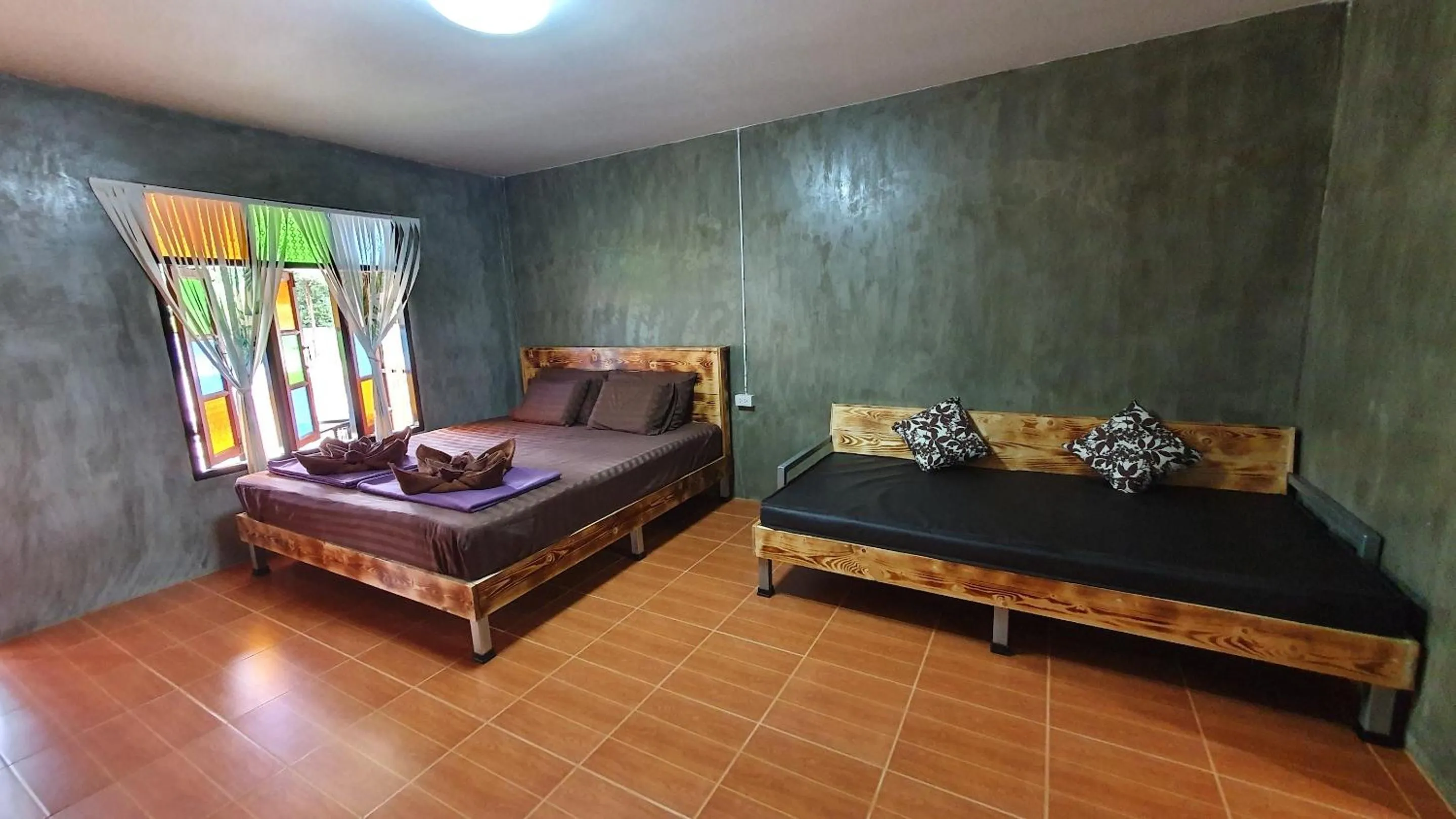 Bed in Moonshine Resort Chumphon