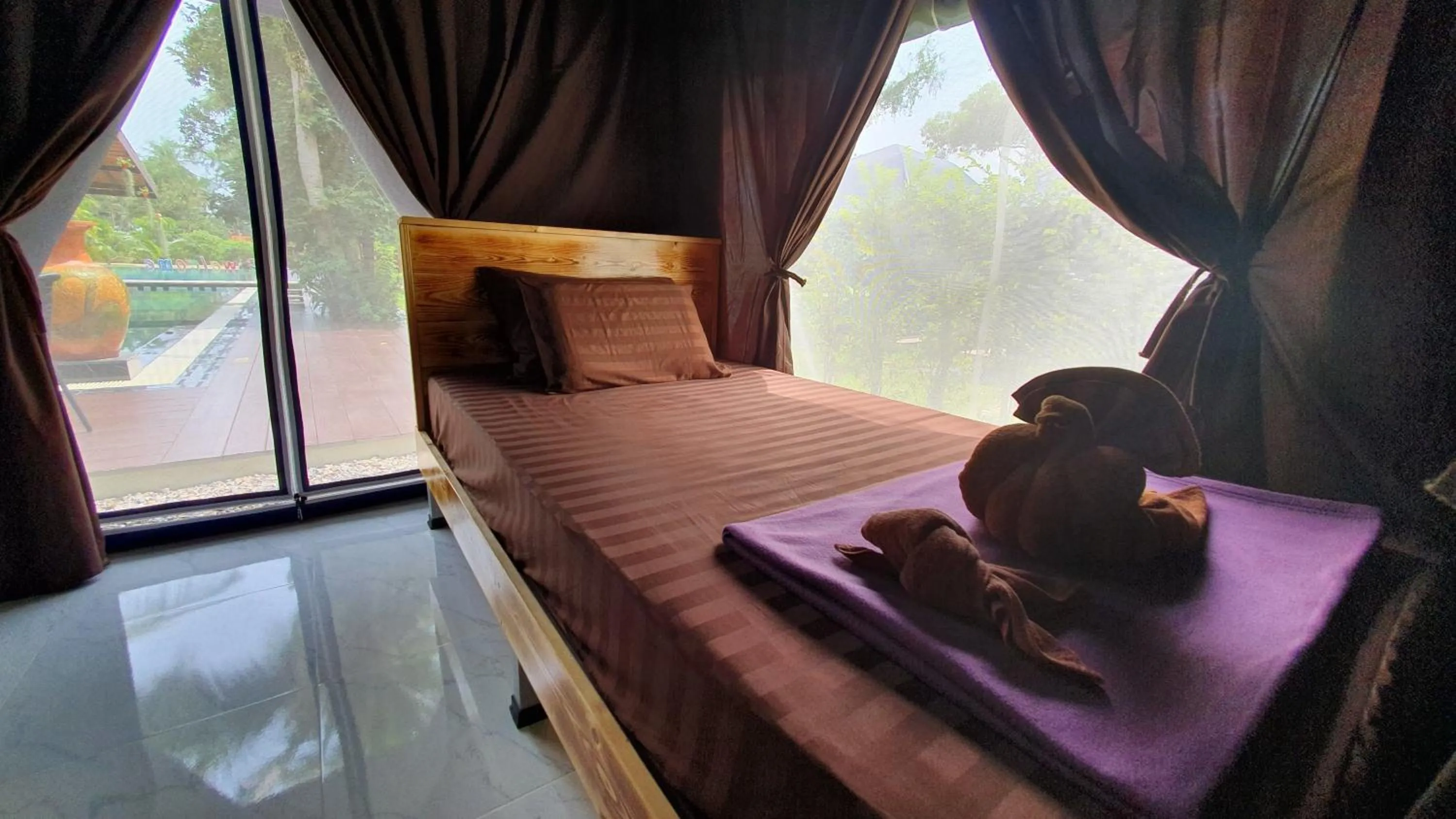 Bed in Moonshine Resort Chumphon