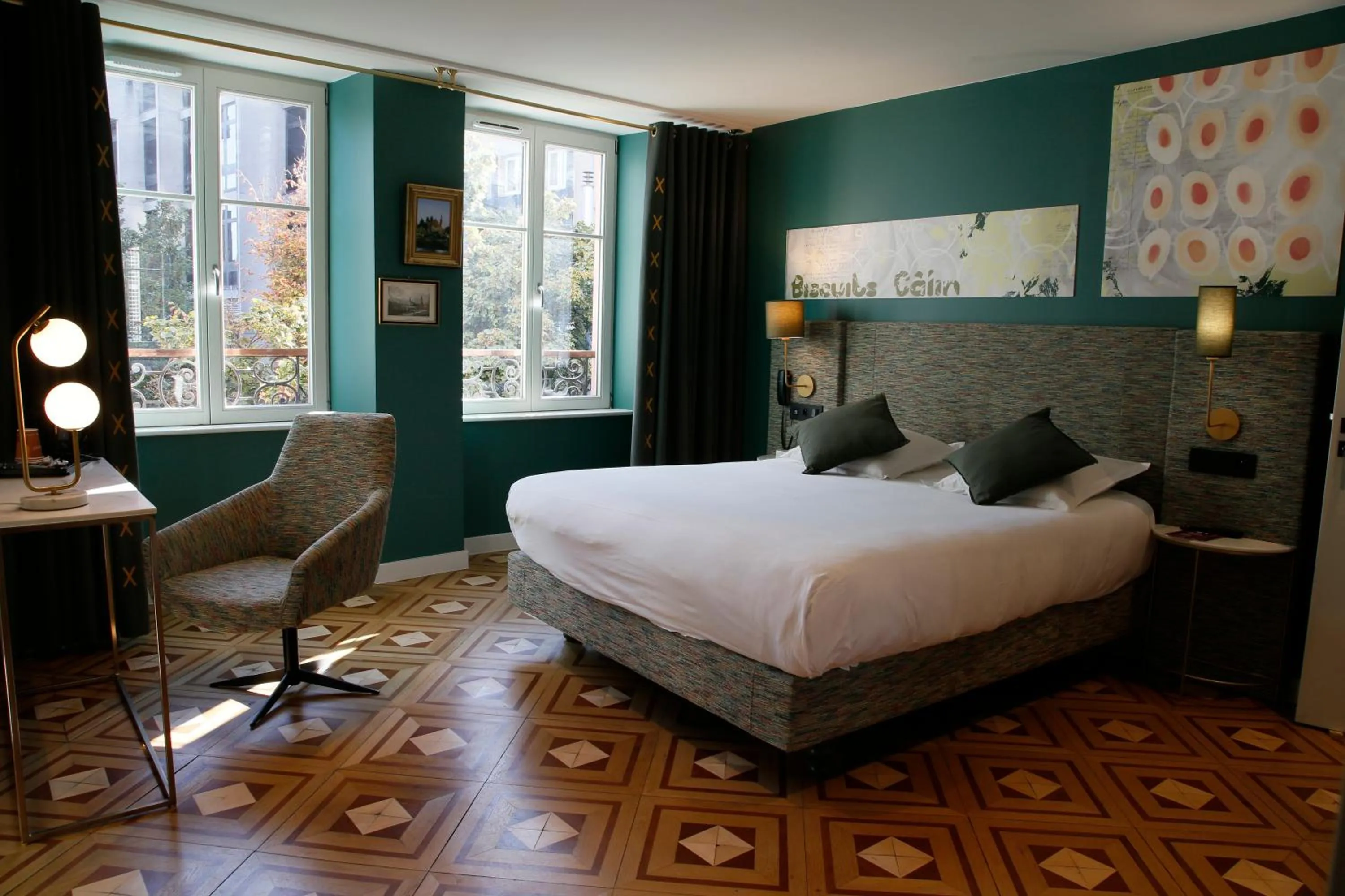 Bed in Le Kléber Hôtel