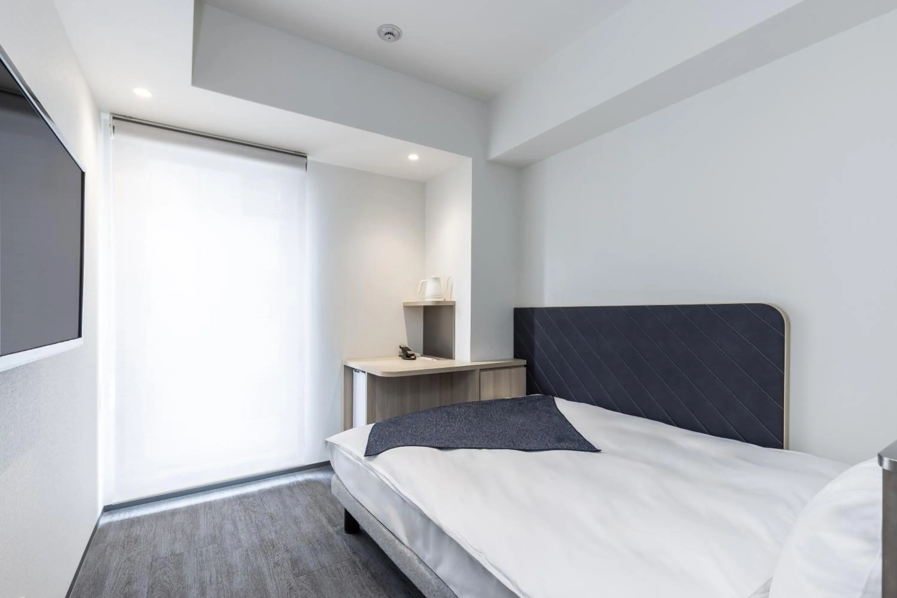 Economy Double Room with Small Double Bed and Shower - single occupancy in Tokyu Stay Osaka Hommachi