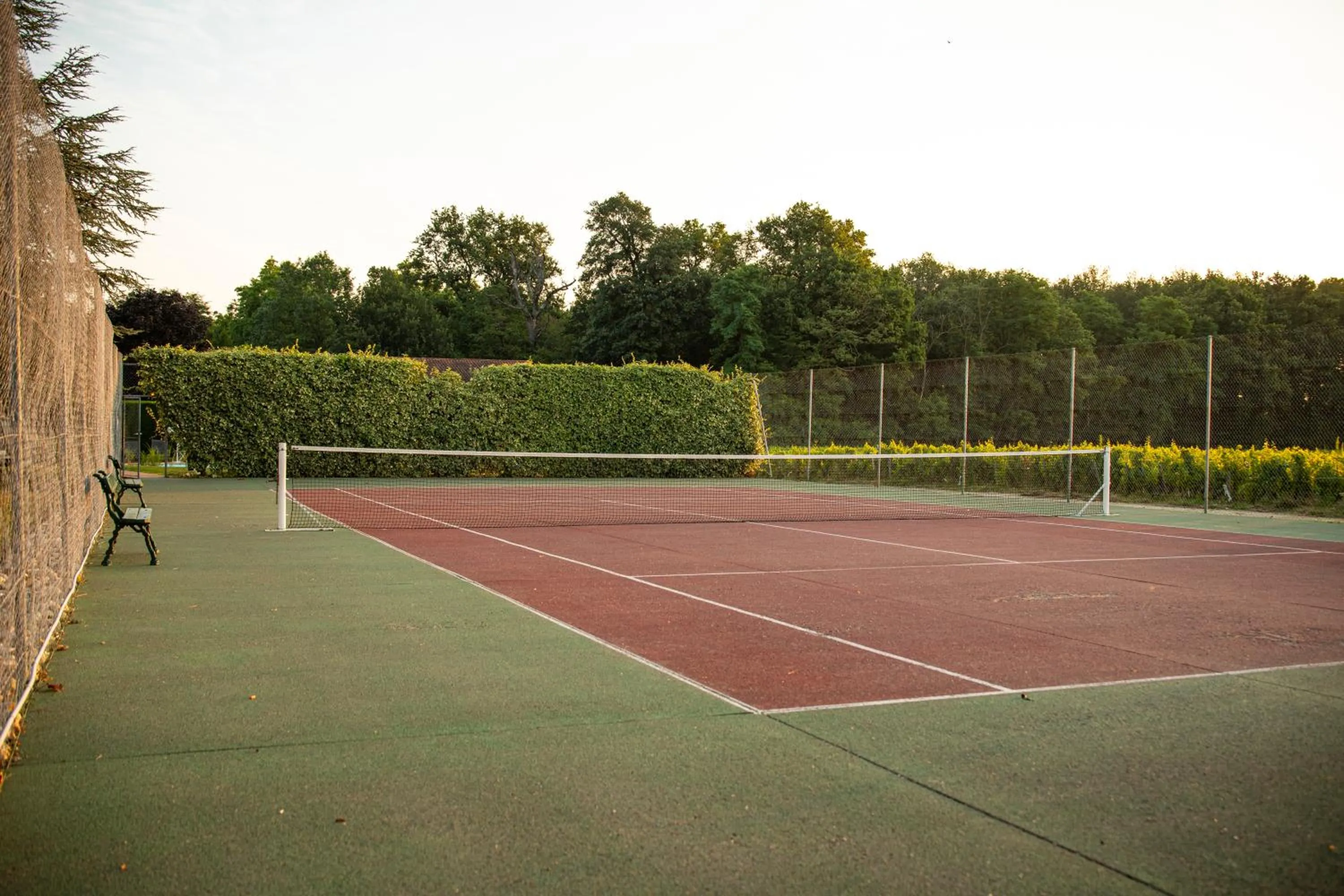 Tennis court in Château de Pizay