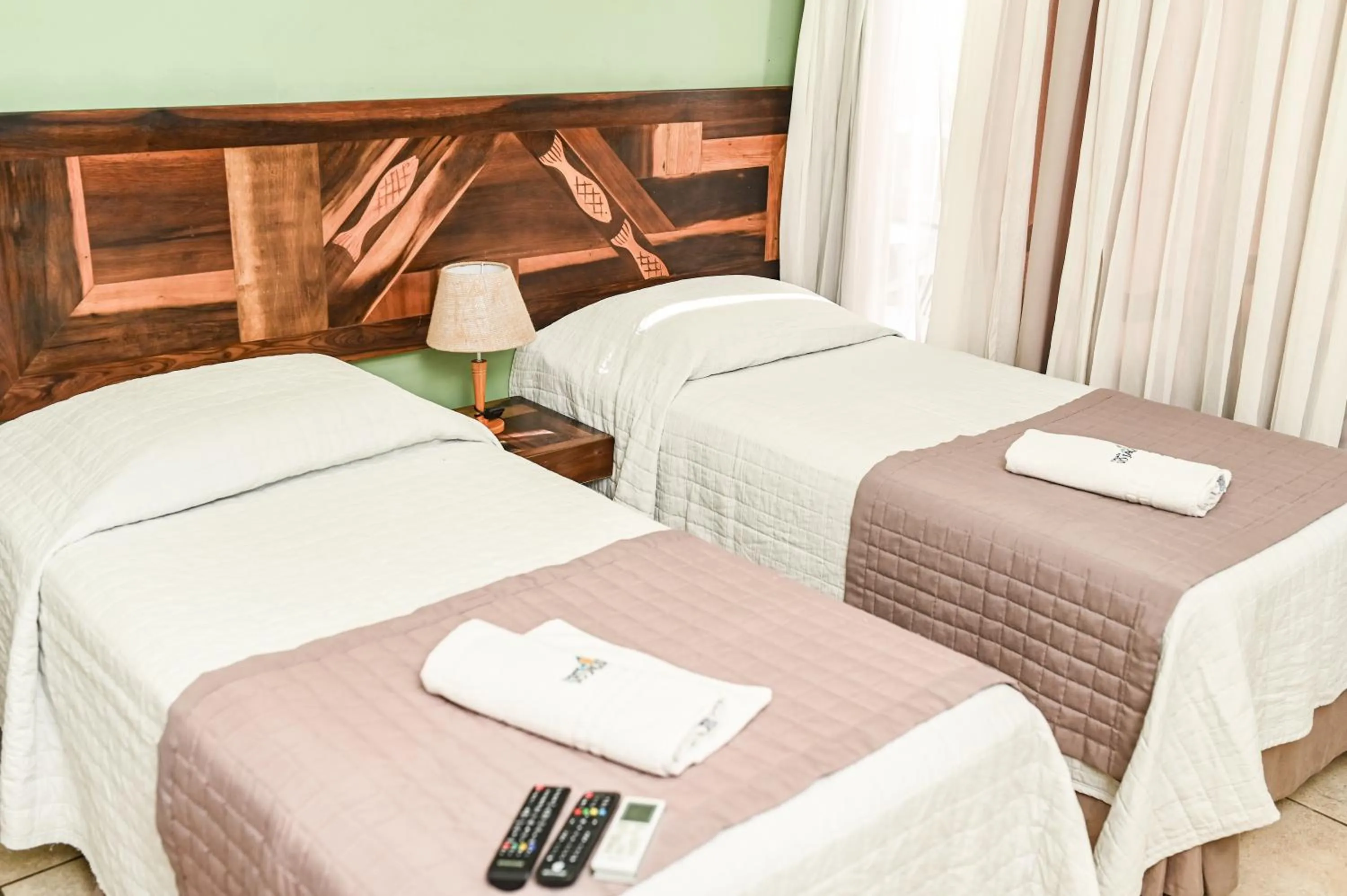 Bed in Pousada Vô Jaques