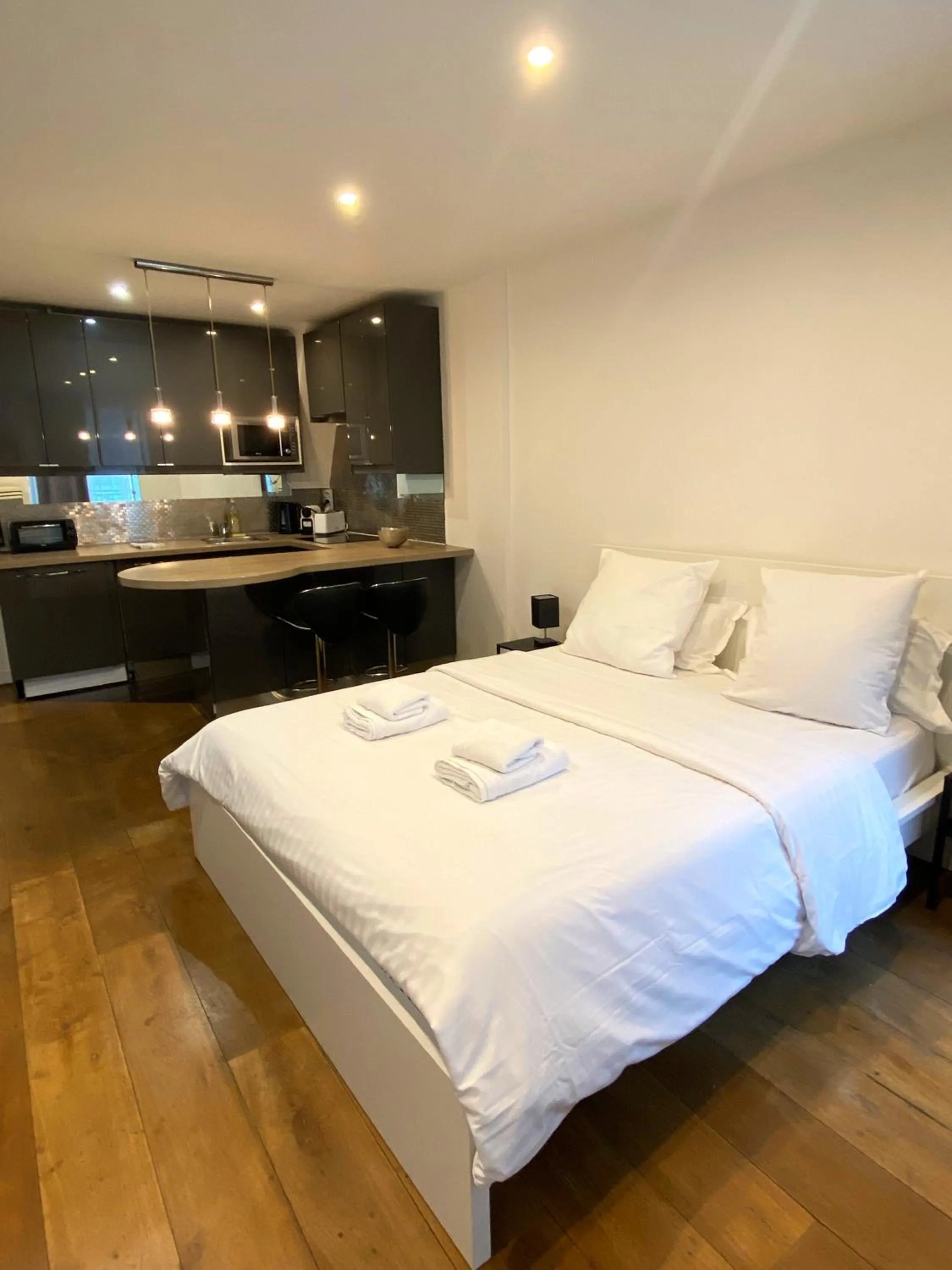 Bed in Maison le Bac Apartments