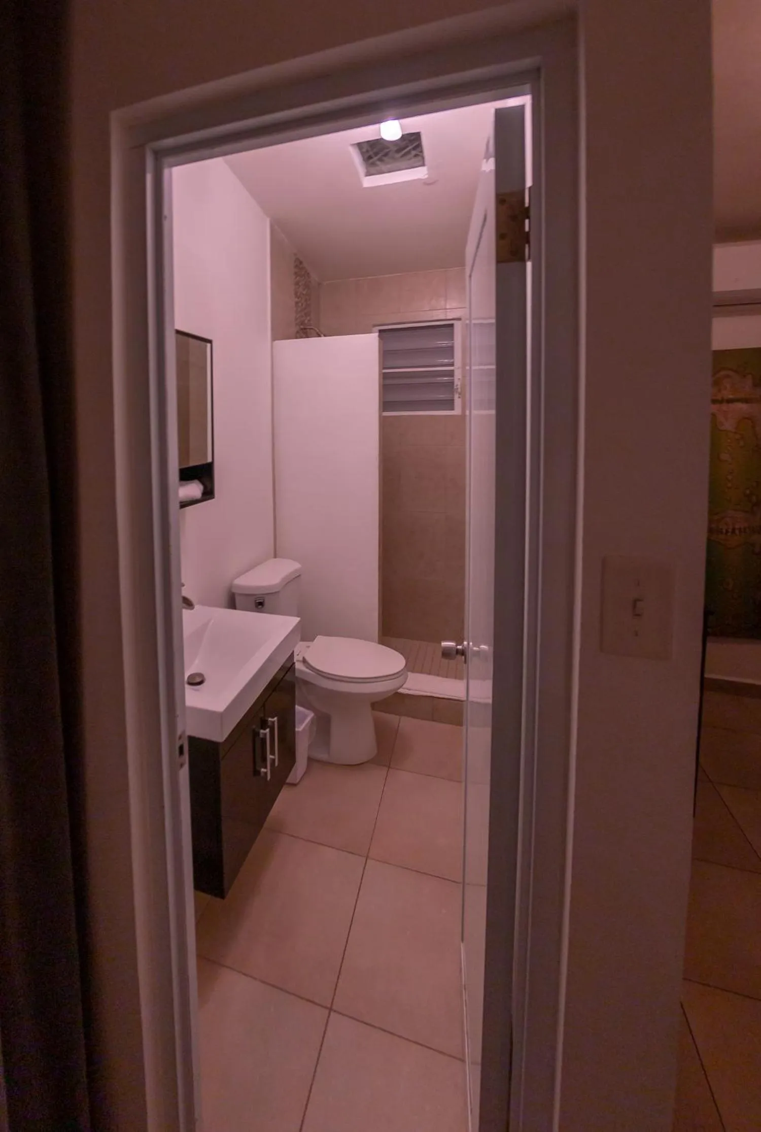 Bathroom in Casa Verde Hotel - Steps to the Beach, Pool, Restaurant & Bar