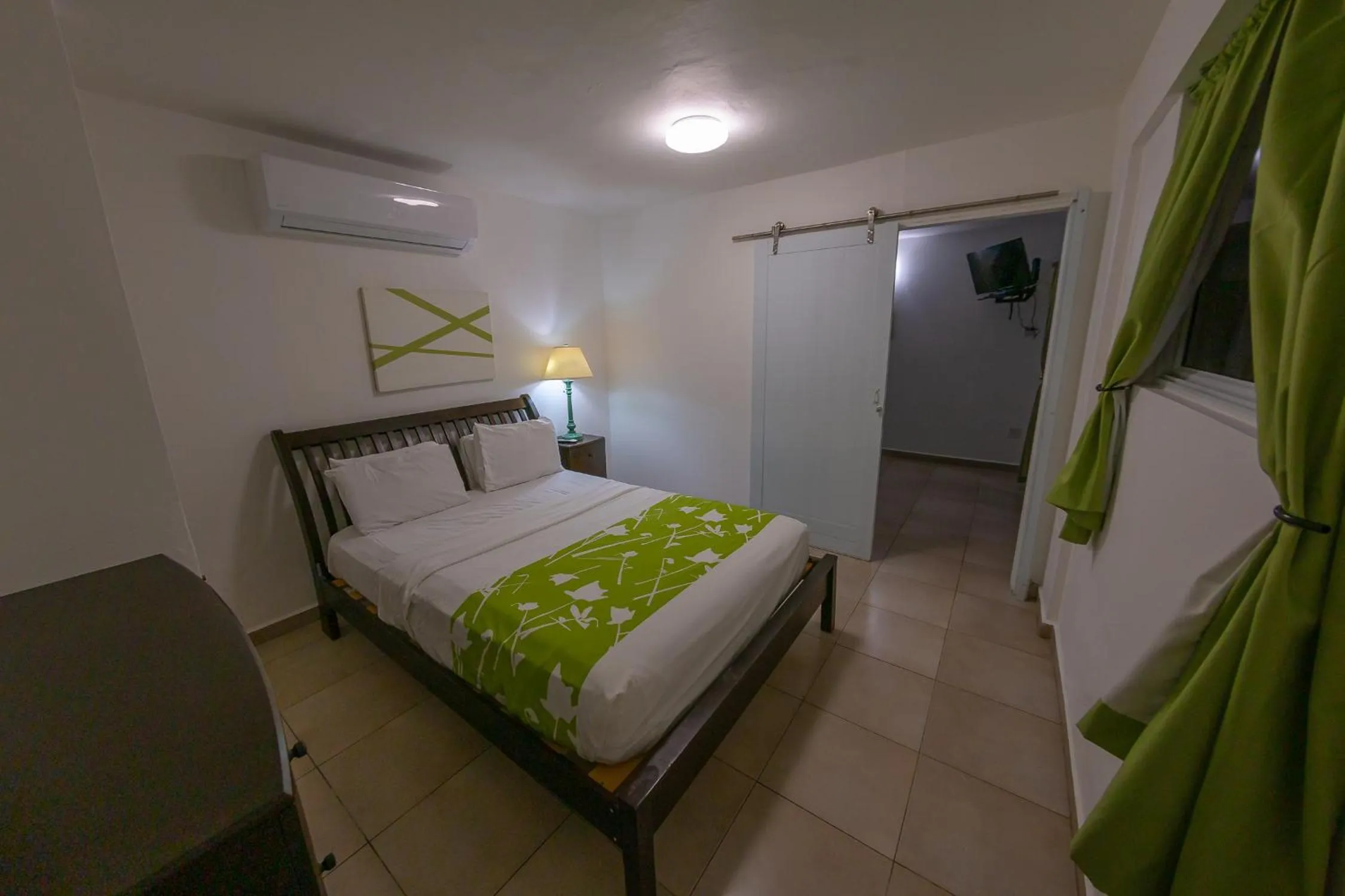 Bed in Casa Verde Hotel - Steps to the Beach, Pool, Restaurant & Bar