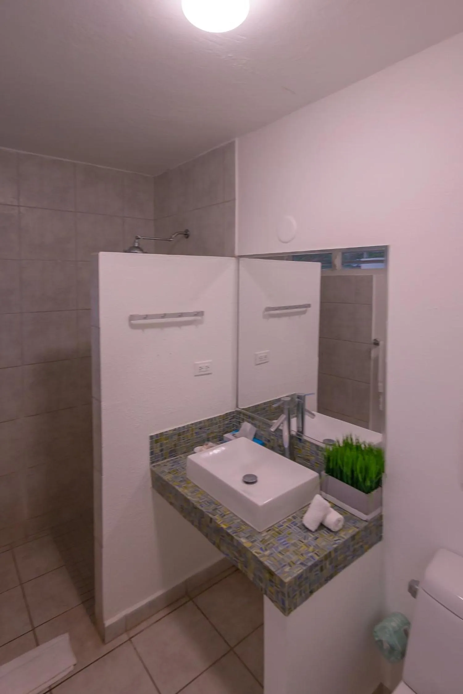 Bathroom in Casa Verde Hotel - Steps to the Beach, Pool, Restaurant & Bar