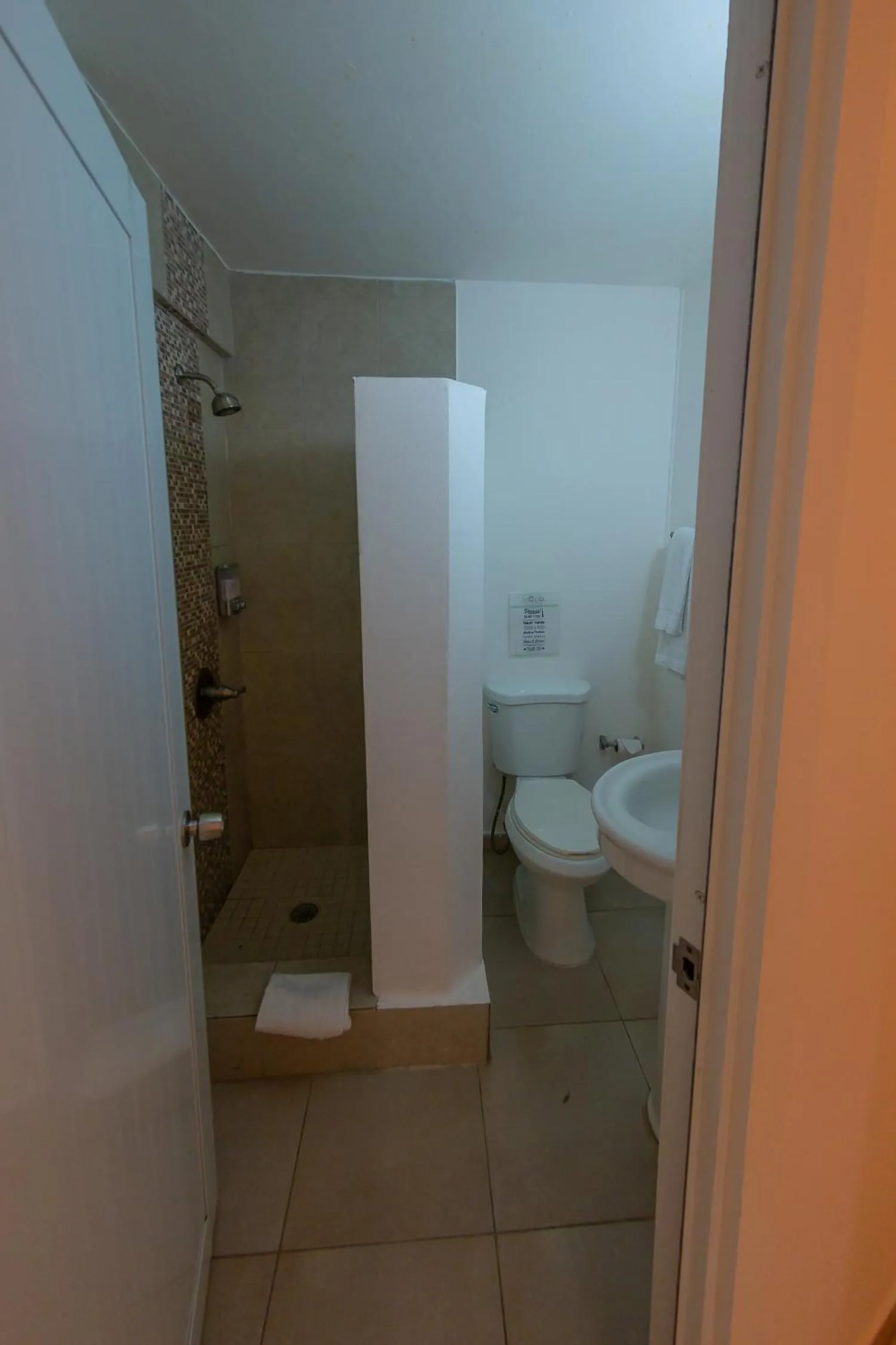 Bathroom in Casa Verde Hotel - Steps to the Beach, Pool, Restaurant & Bar