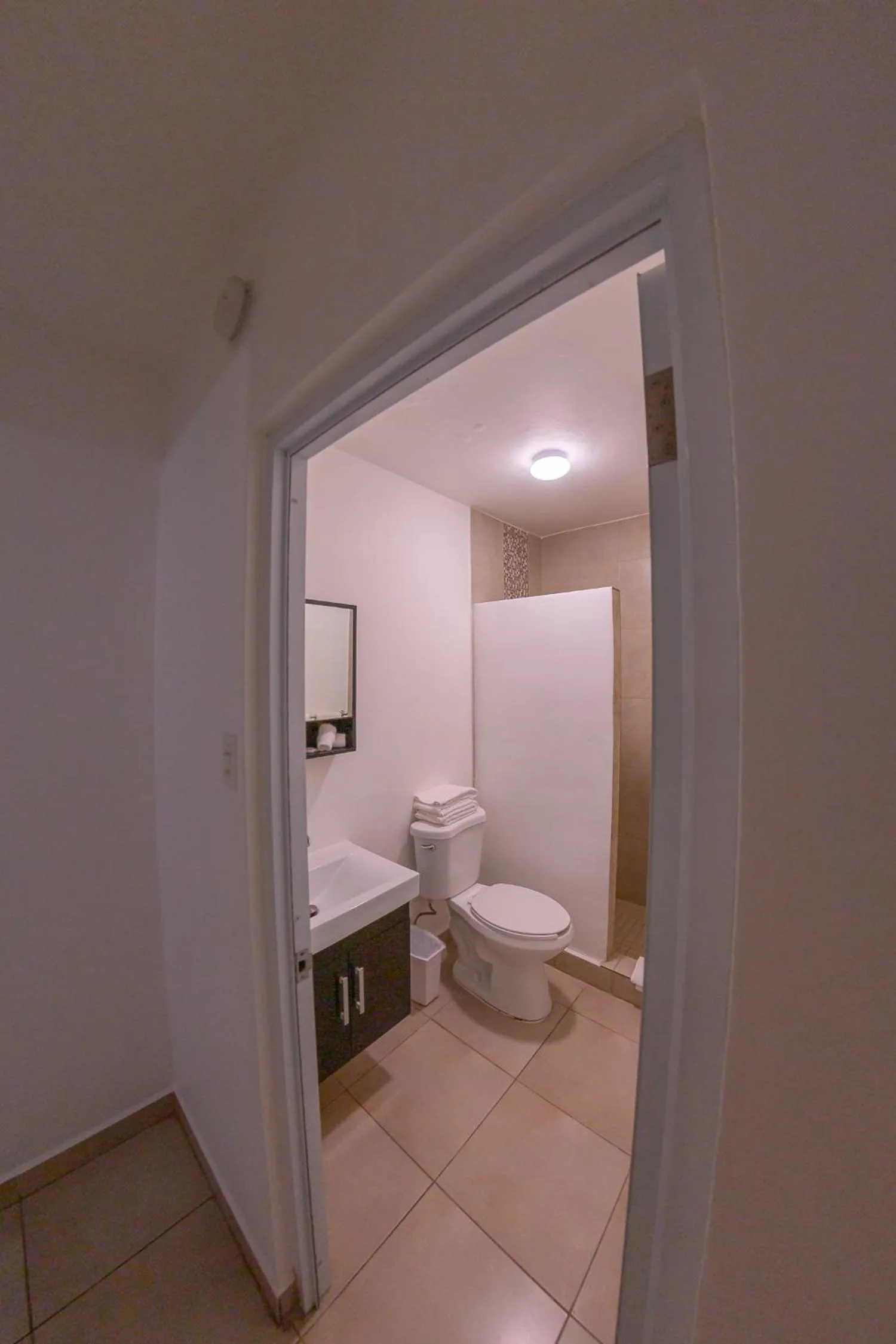 Toilet in Casa Verde Hotel - Steps to the Beach, Pool, Restaurant & Bar