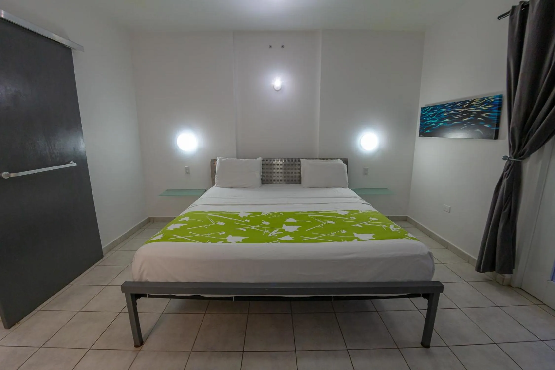 Bed in Casa Verde Hotel - Steps to the Beach, Pool, Restaurant & Bar