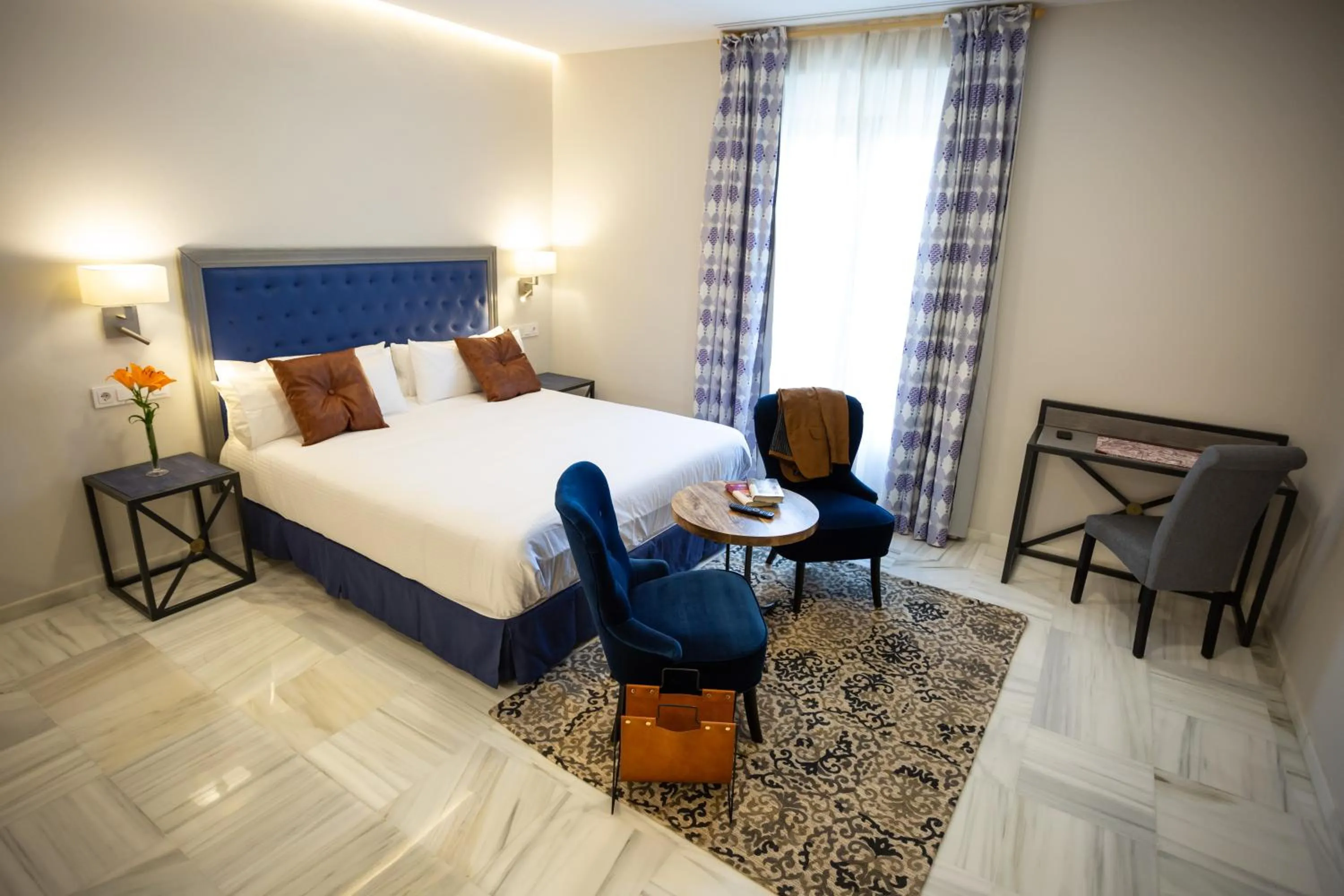 Bed in Plazuela del Carbón Suites