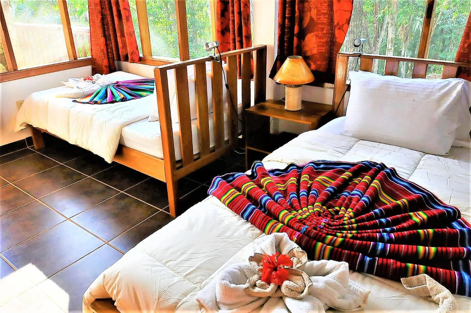 Bed in Mariposa Jungle Lodge