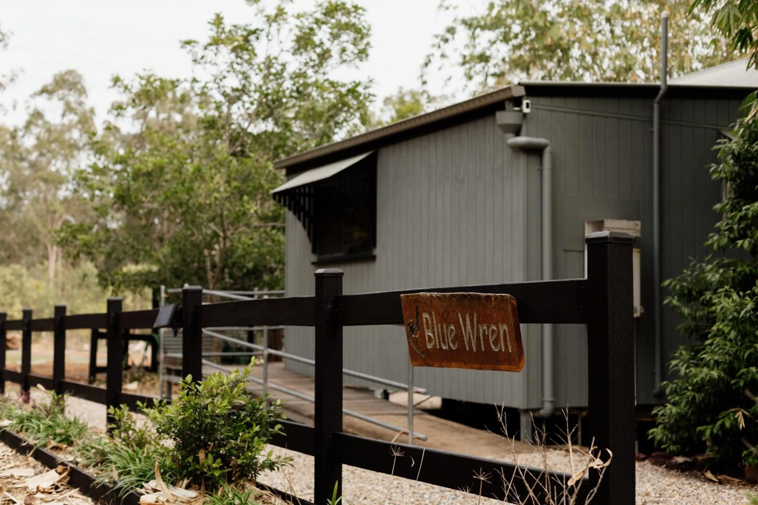 Property building in Tuckeroo Cottages & Gardens - Blue Wren & Kookaburra