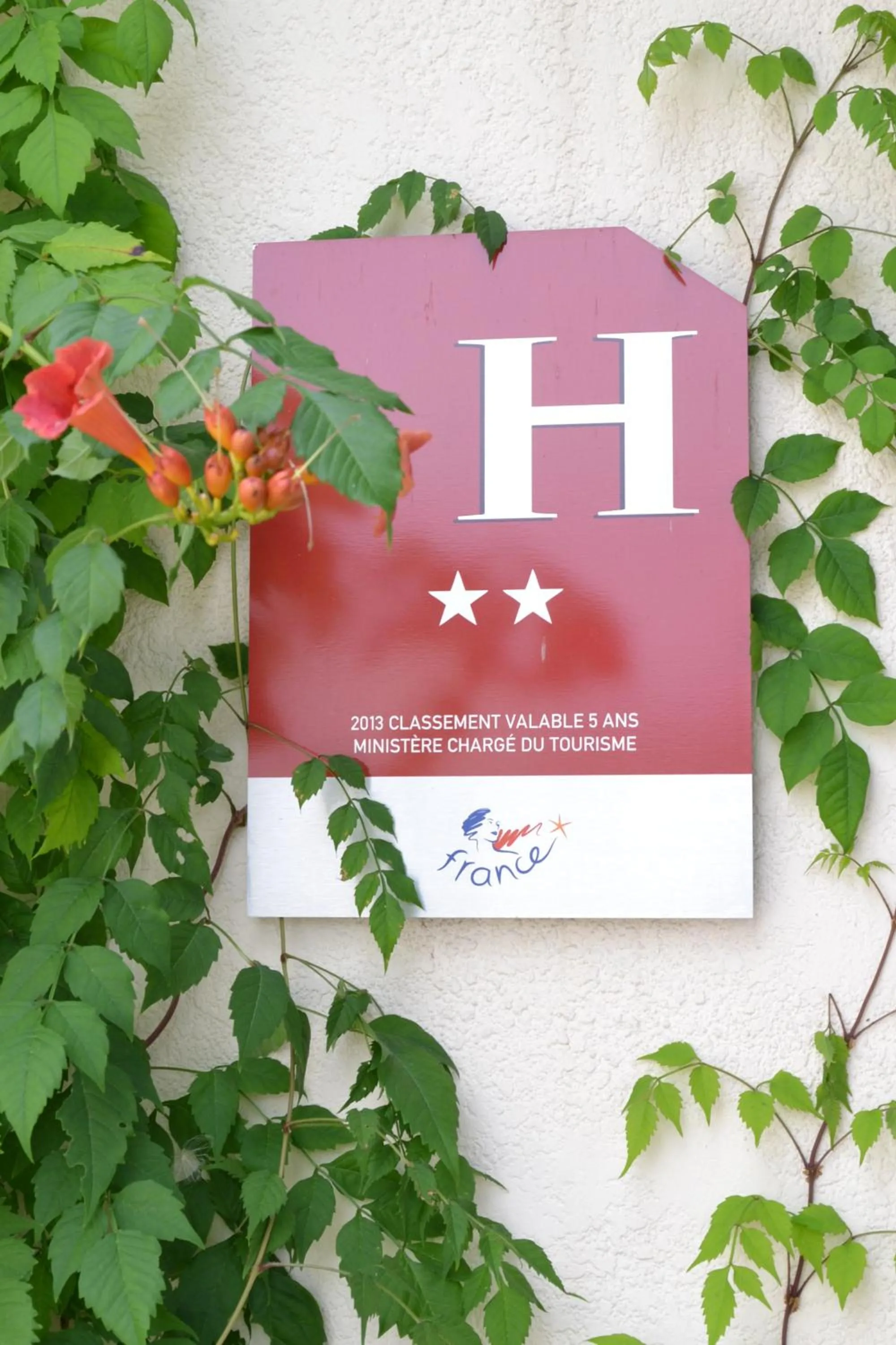 Property logo or sign in Brit Hotel Essentiel Pontivy Robic