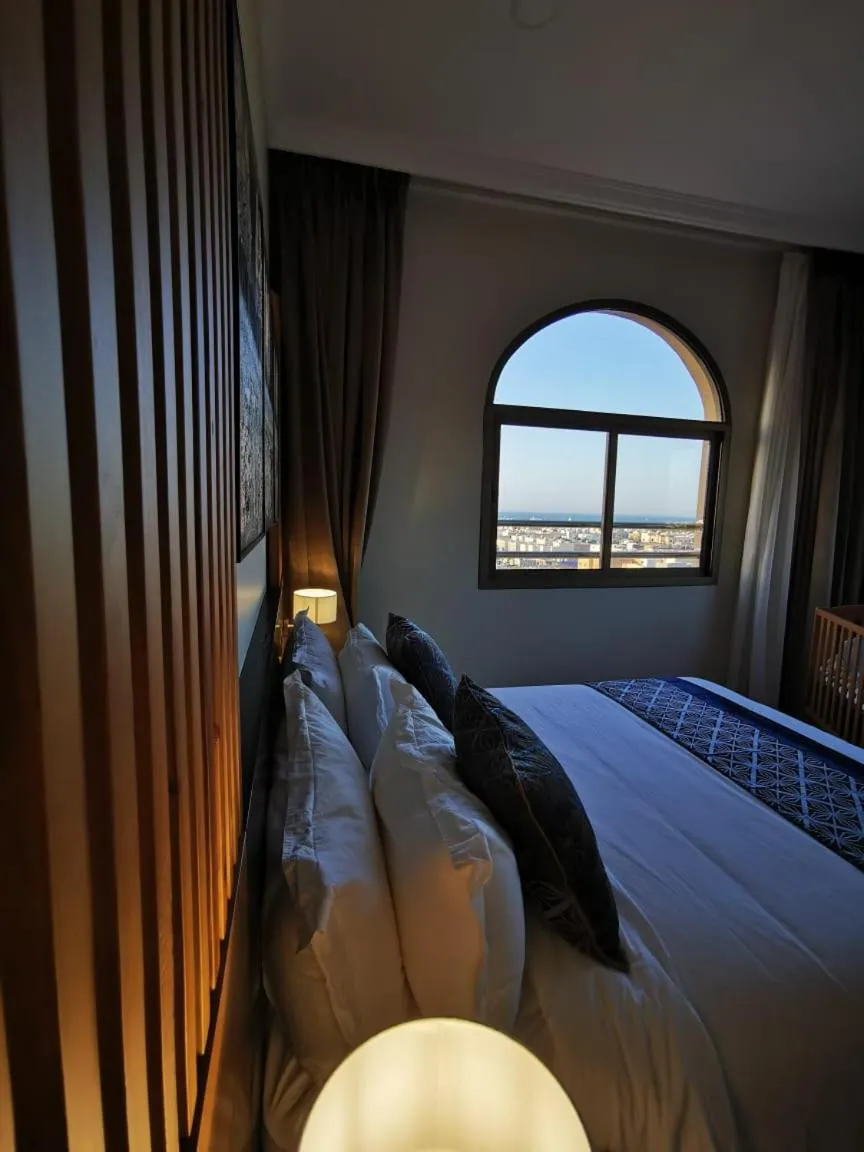 Bed in Tripper Inn Dammam