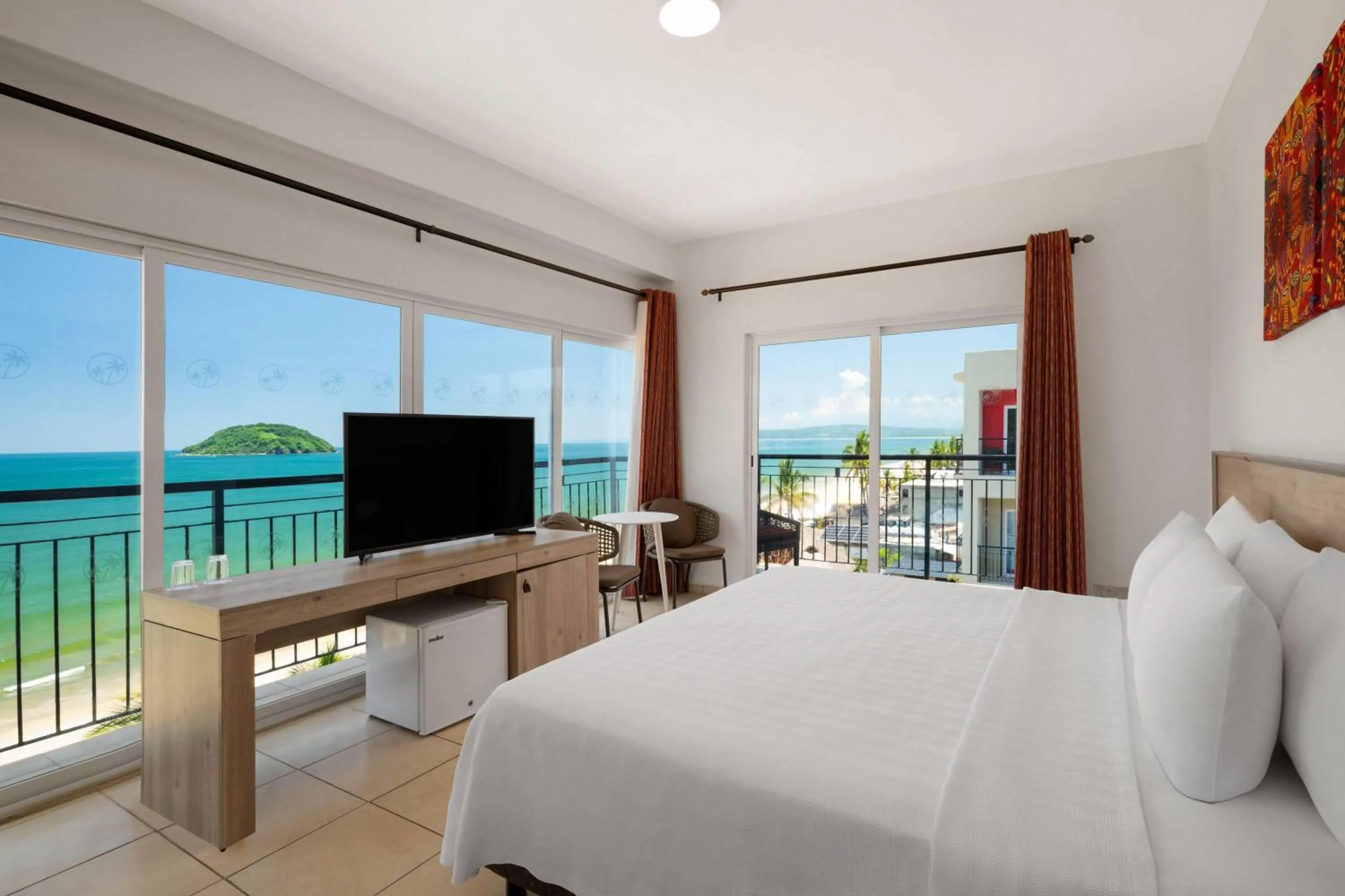 Photo of the whole room, Bed in Decameron Isla Coral Guayabitos, Ramada All-Inclusive Resort