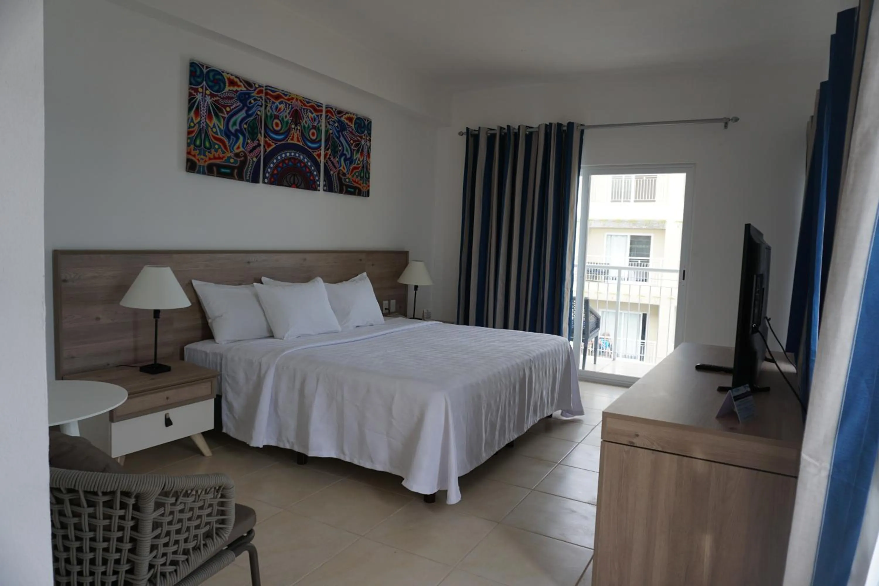 Bed in Decameron La Marina Guayabitos, Ramada All-Inclusive Resort
