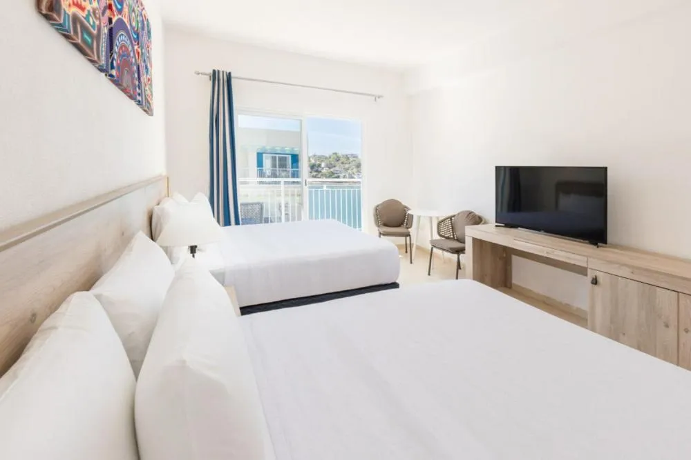 Bed in Decameron La Marina Guayabitos, Ramada All-Inclusive Resort