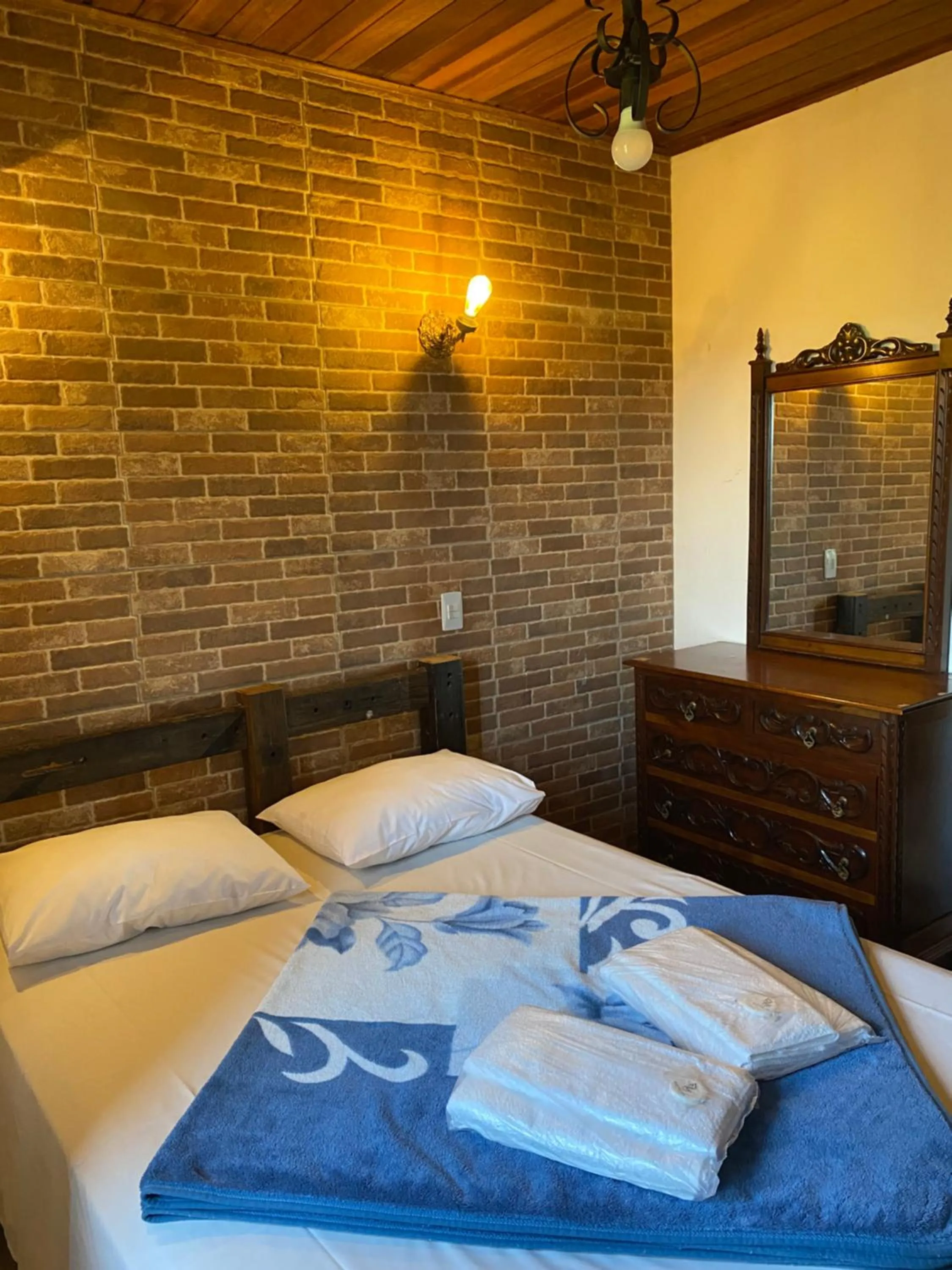 Bed in Chalés Marinelli em São Roque