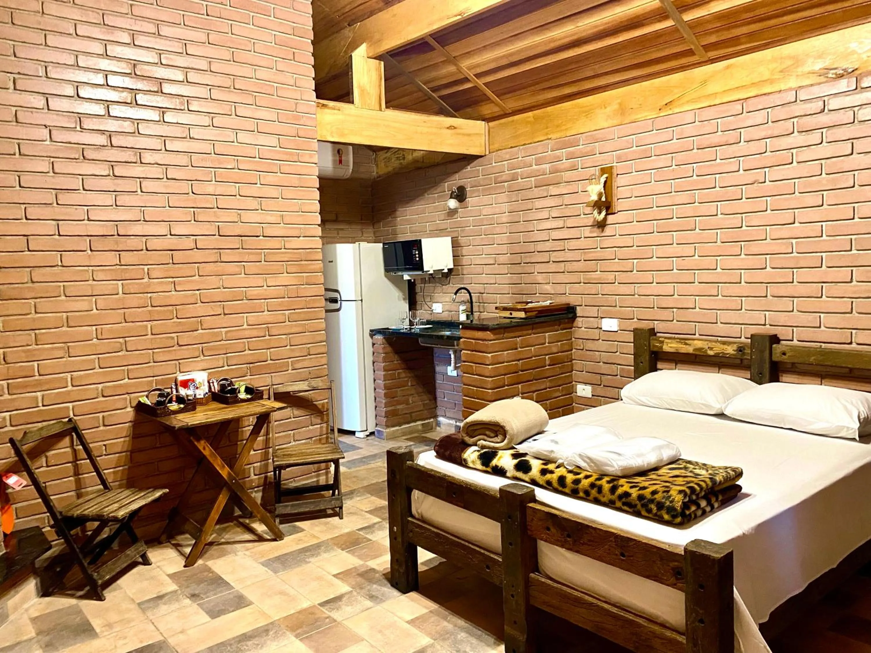 Bed in Chalés Marinelli em São Roque