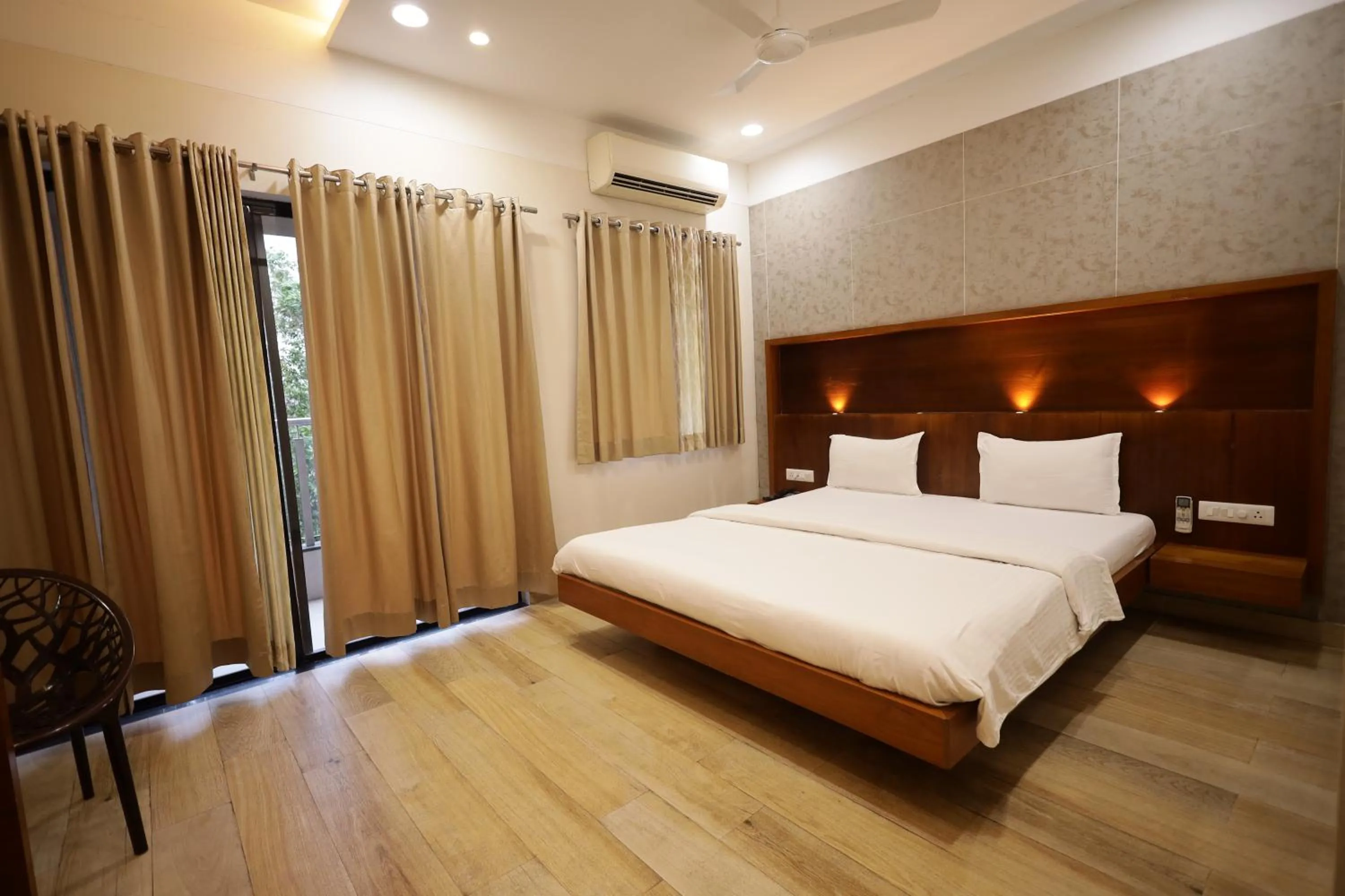 Bed in Hotel President Banquet & Lawn