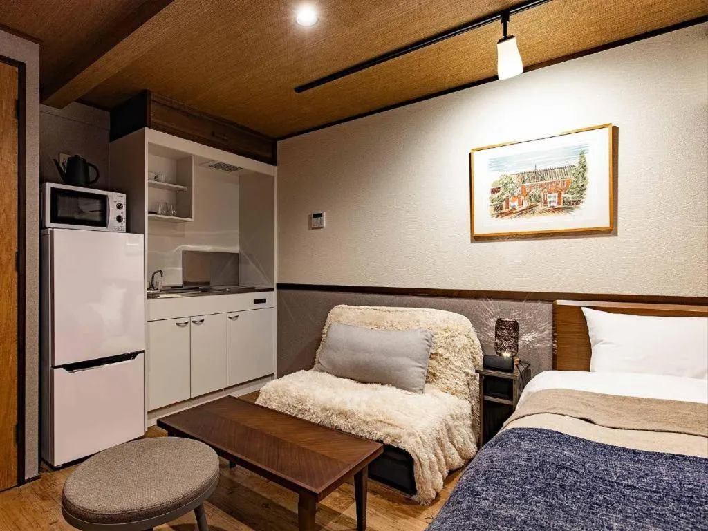 Bed in Wow! KANAZAWA STAY