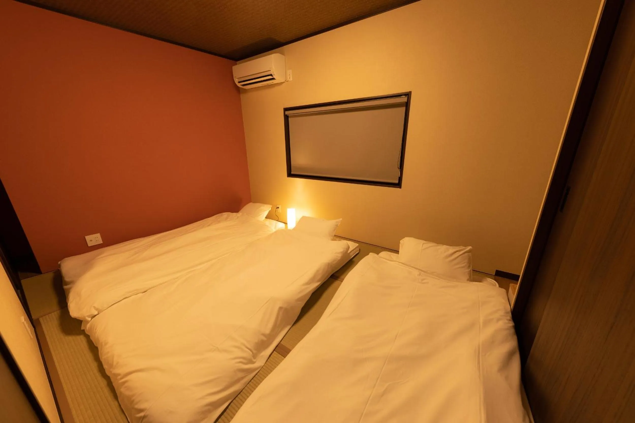 Bed in Wow! KANAZAWA STAY